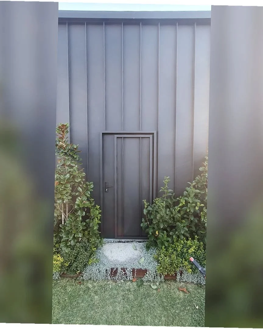 Clean finish. Clients wanted the door to match in with the rest of their shed. Mission accomplished. 

@revolutionroofing Maxline sheets and custom flashing in STEALTH.

#perthbuilders#bbs#topgun#carpentry#carpentryaustralia#maximumeffort