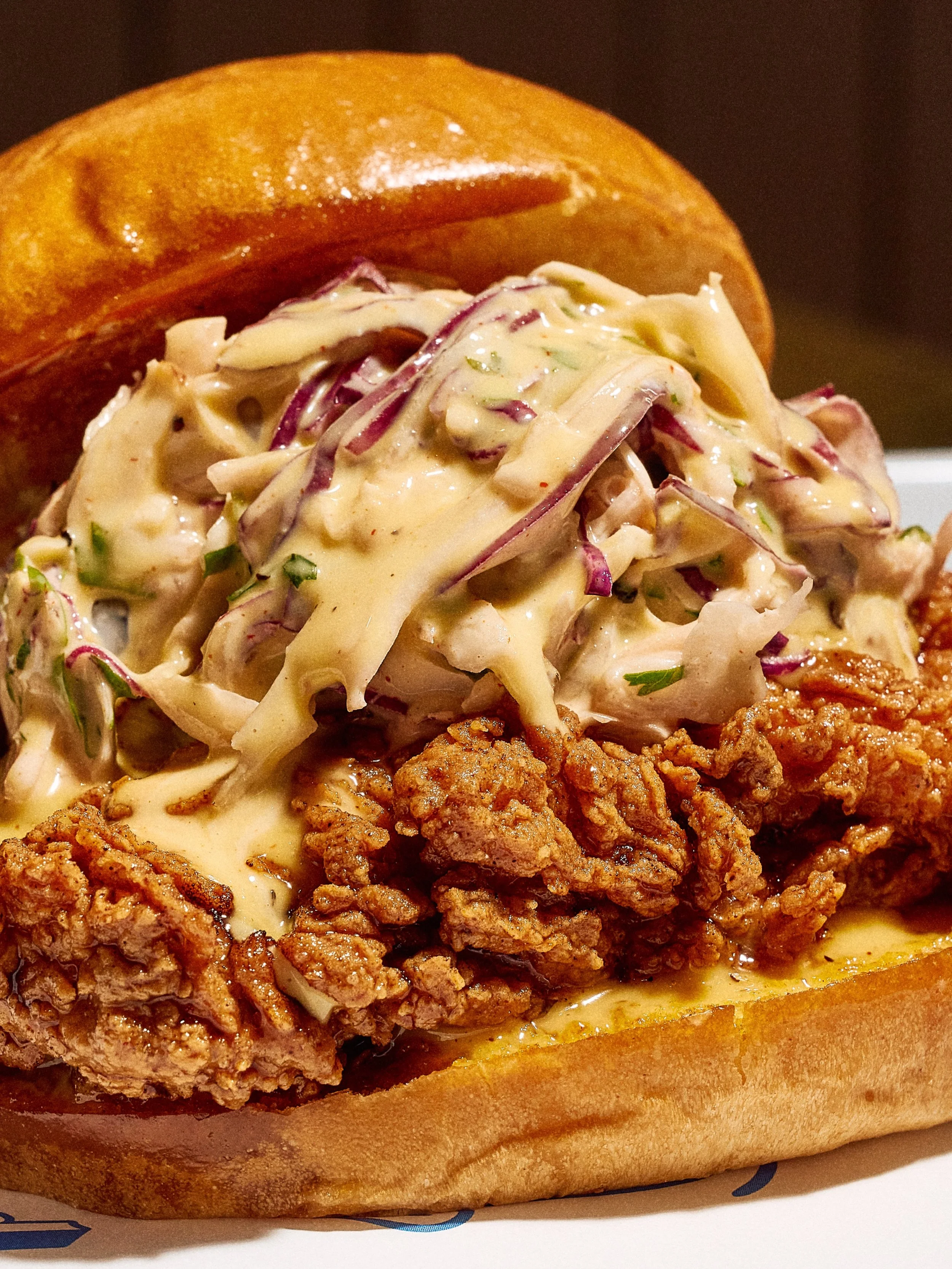 Crispy chicken, habanero honey, wasabi slaw. All the sensations in one.