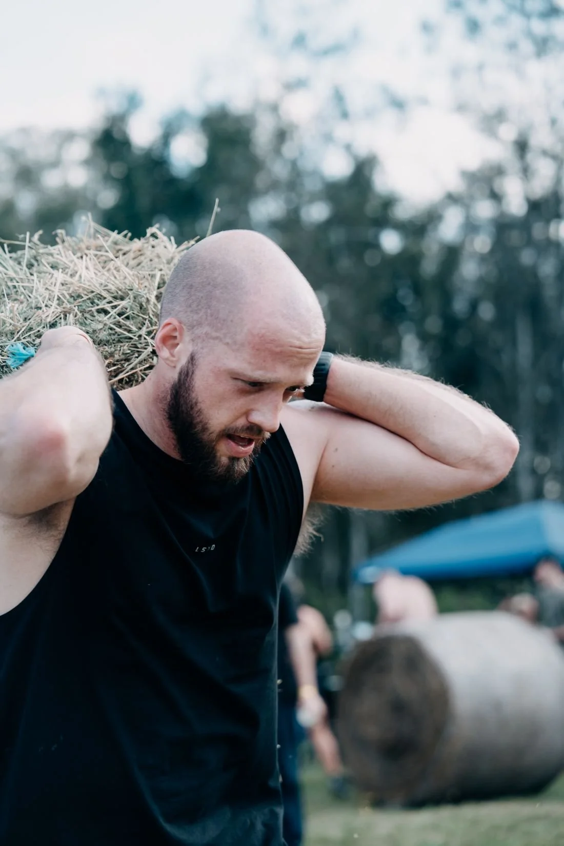 12-farm-jam-2026-hay-bale-carry-close.jpg