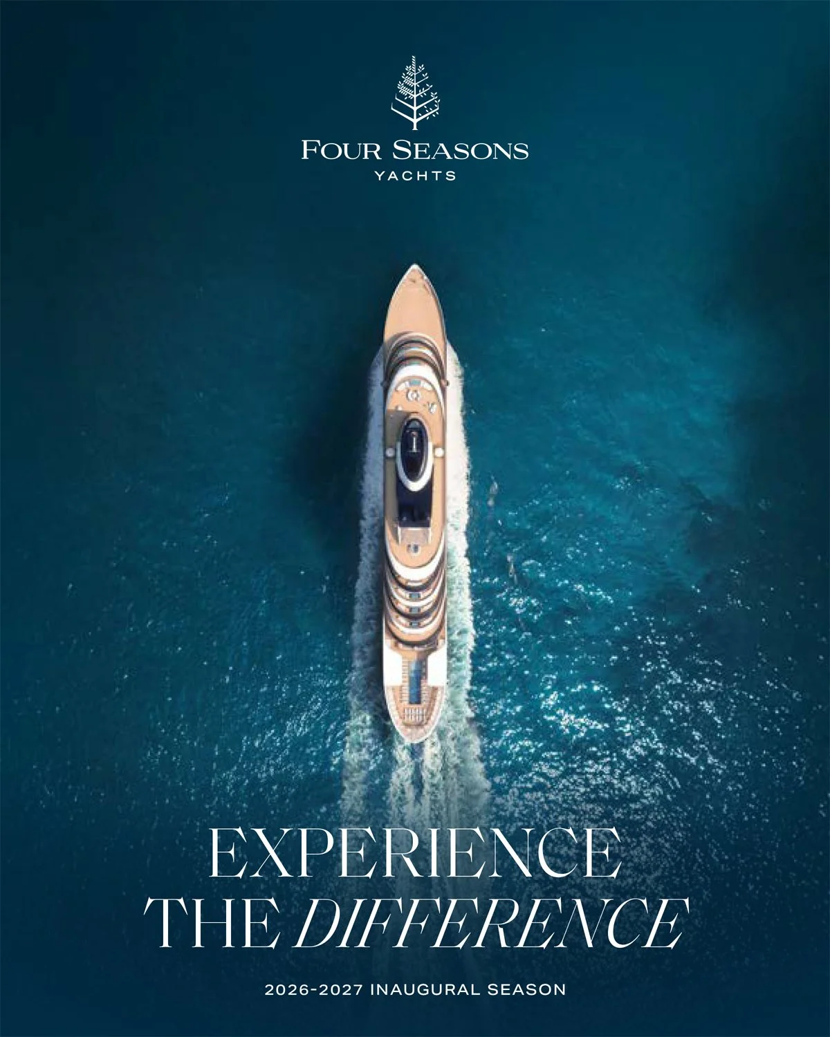 Aerial view of a luxury Four Seasons Yacht sailing through deep blue ocean water, promoting the 2026-2027 inaugural season for luxury cruise planning.