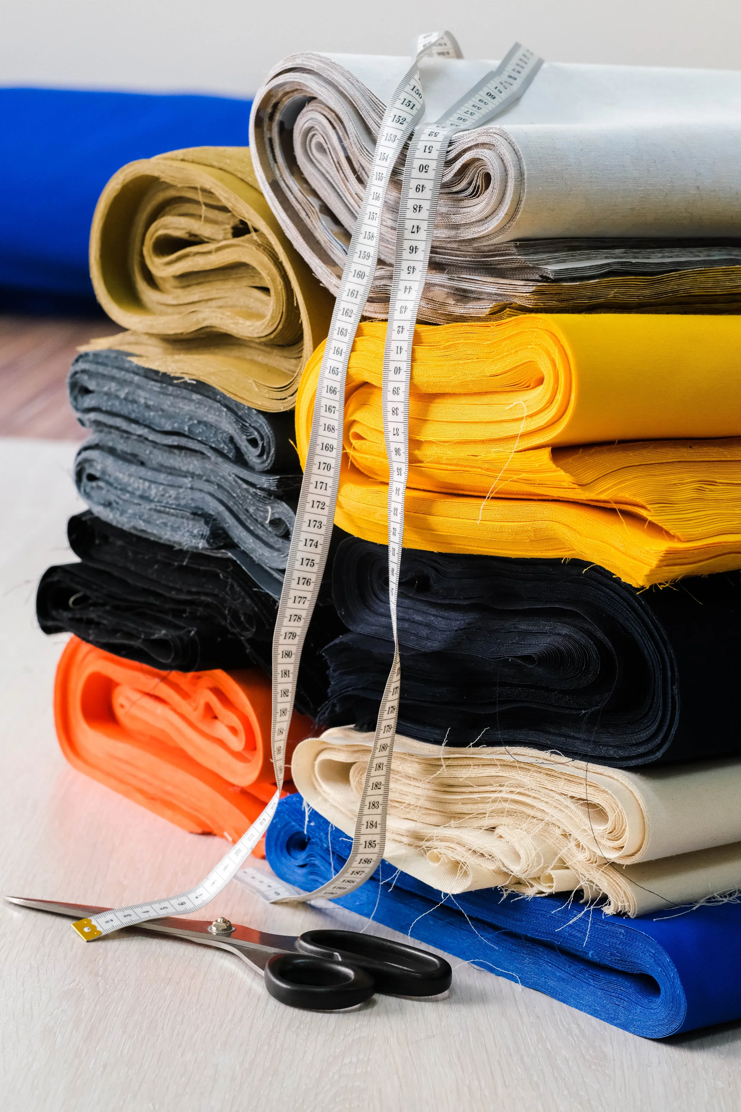 stack-of-colorful-natural-fabrics-on-the-table-2025-03-05-04-50-55-utc.jpg