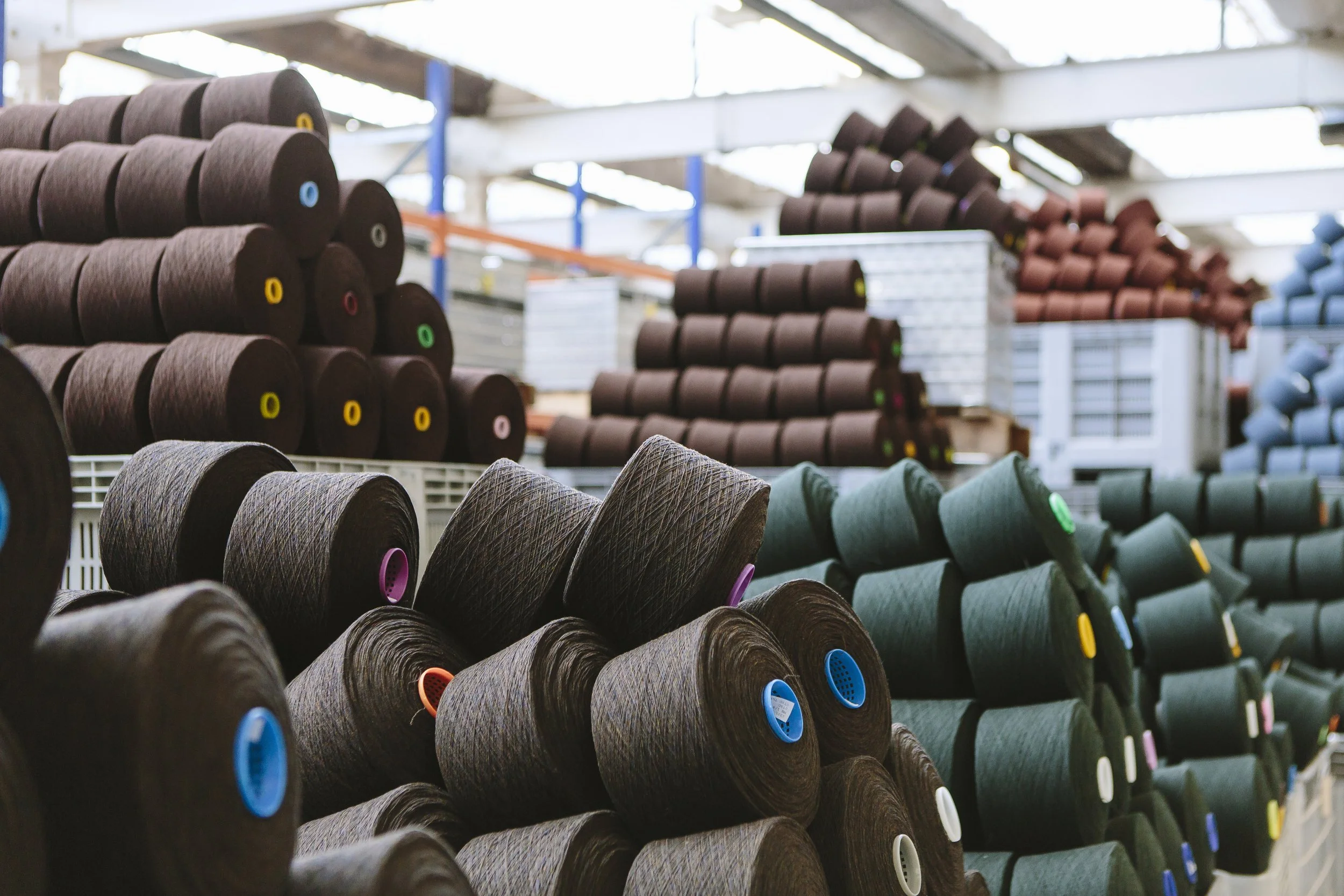 reels-of-wool-in-storage-room-in-woollen-mill-2024-11-03-02-46-57-utc.jpg