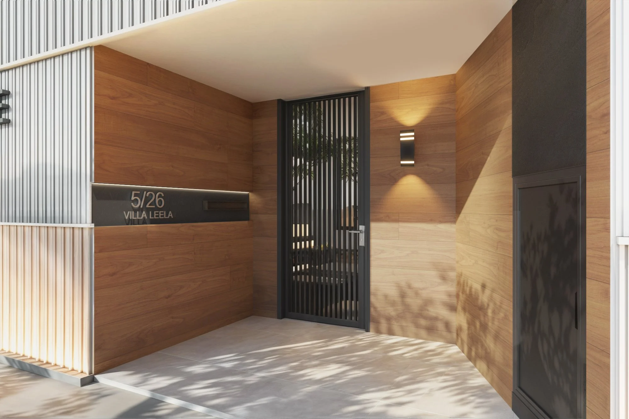 Luxury eco-friendly villa entrance in Phuket featuring warm wooden cladding, black metal gate, and private address signage.