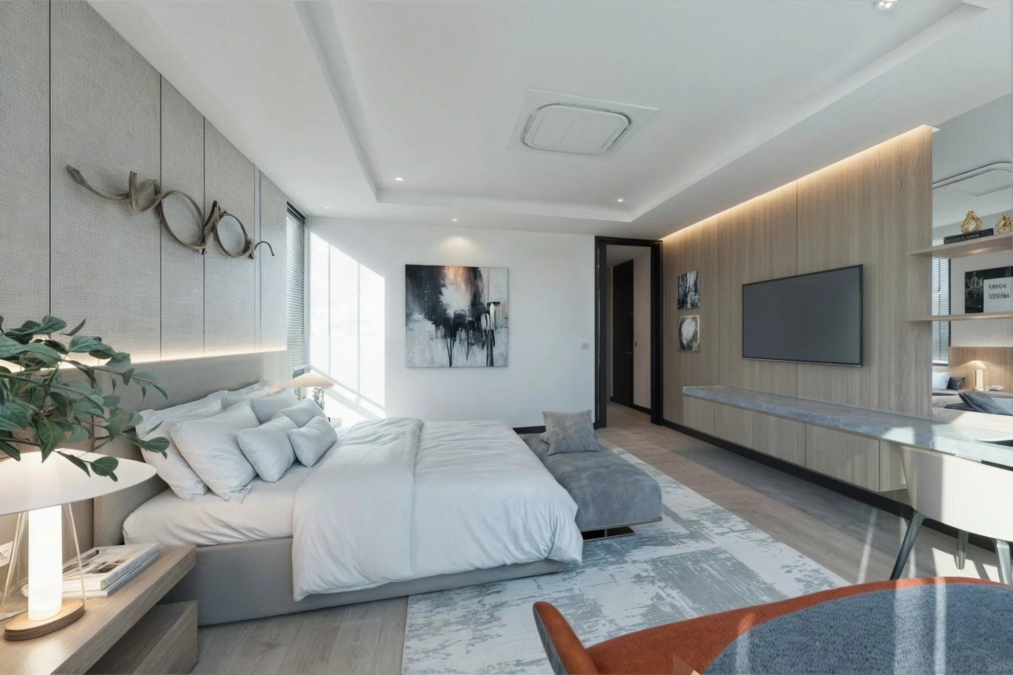 Spacious bedroom suite with integrated seating area, soft lighting, and floor-to-ceiling curtains.
