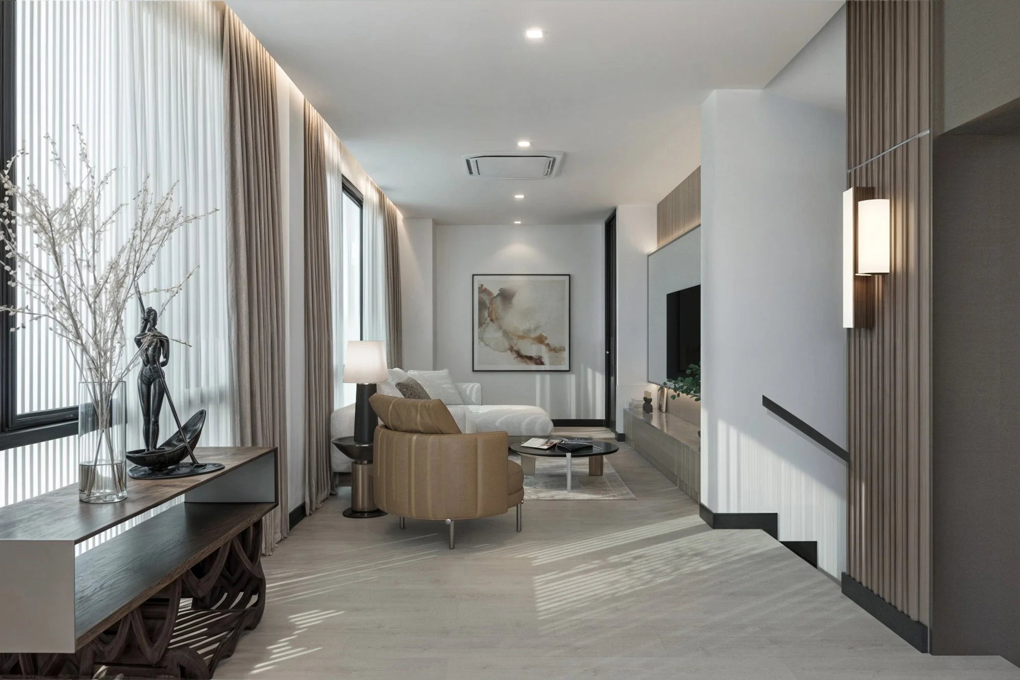 Private lounge seating area with soft neutral tones and warm architectural lighting.