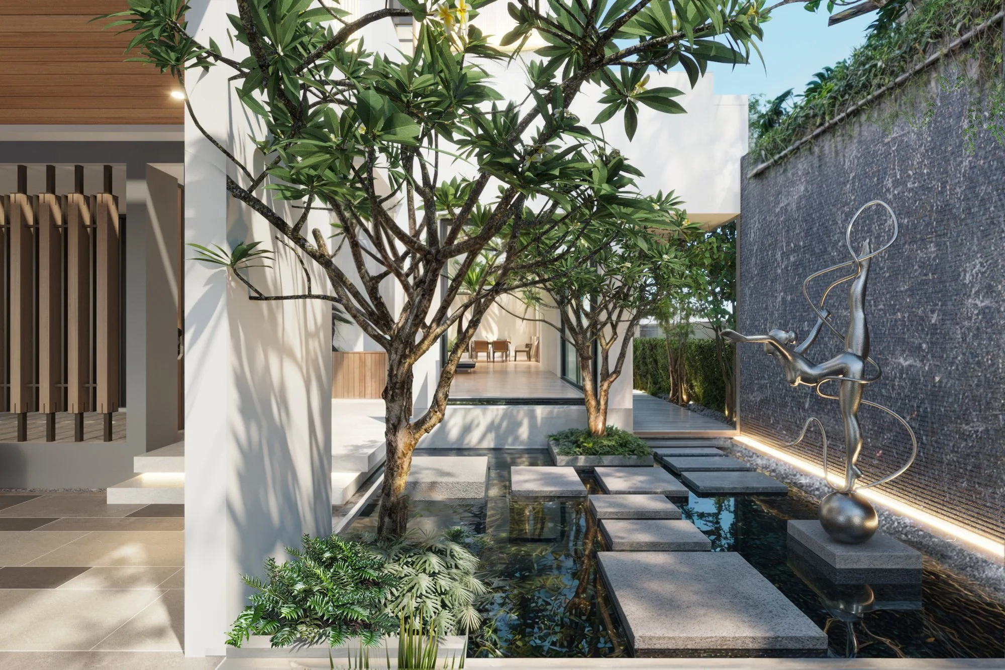 Sunken outdoor lounge surrounded by tropical plants and shaded architectural overhangs.