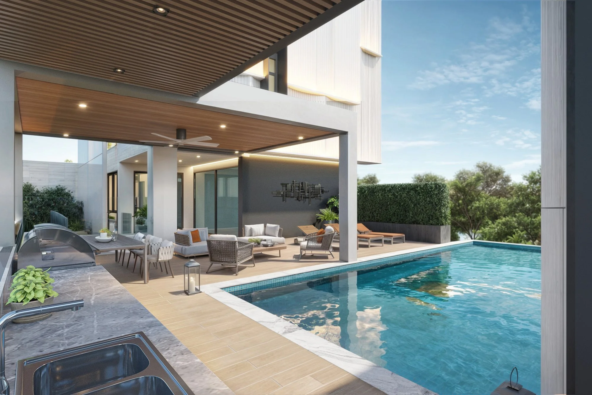 Luxury infinity-edge swimming pool with shaded terrace and seamless indoor-outdoor living design in Phuket.