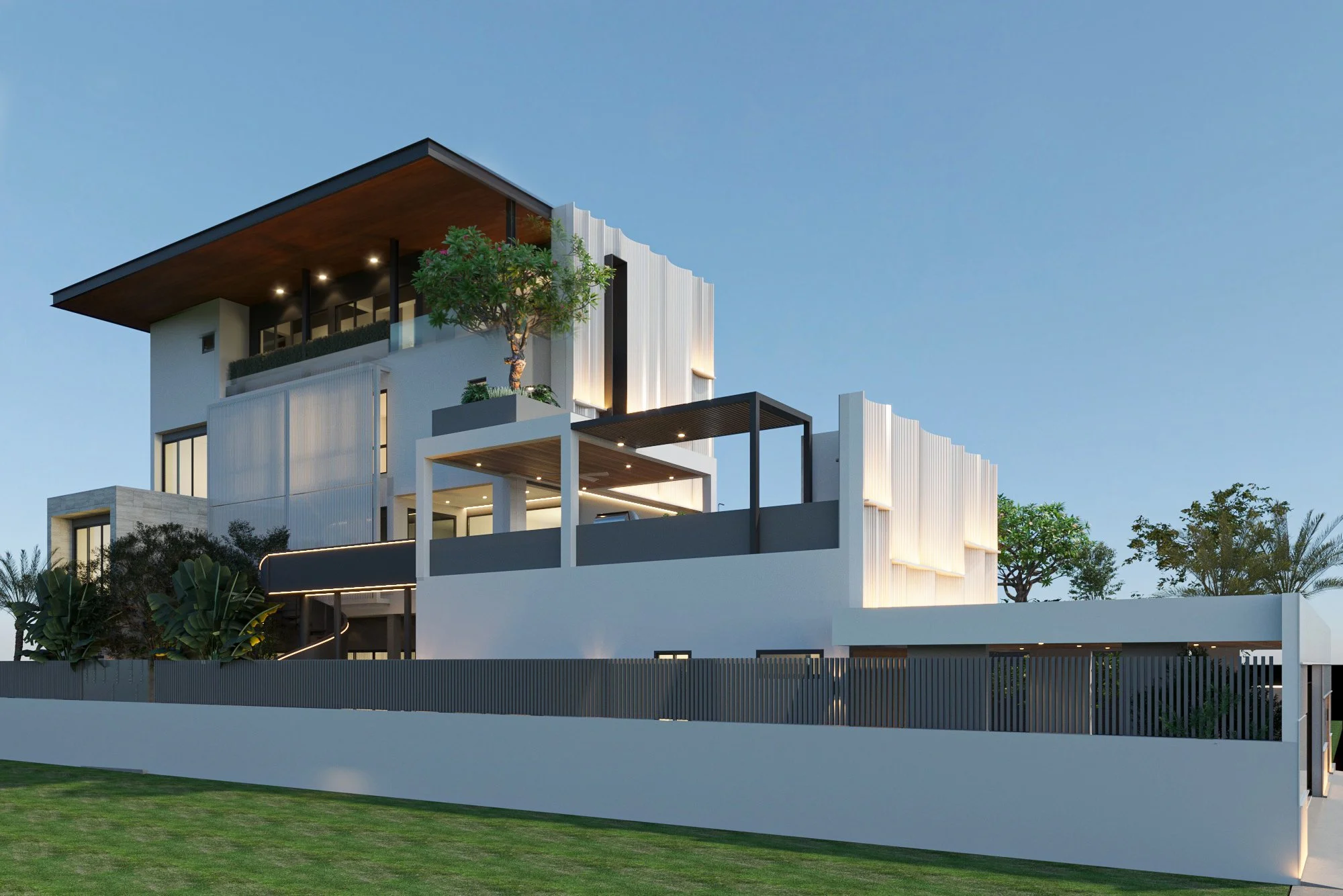 Modern multi-story house with white exterior, large windows, outdoor terraces, and landscaped greenery, set against a blue sky.