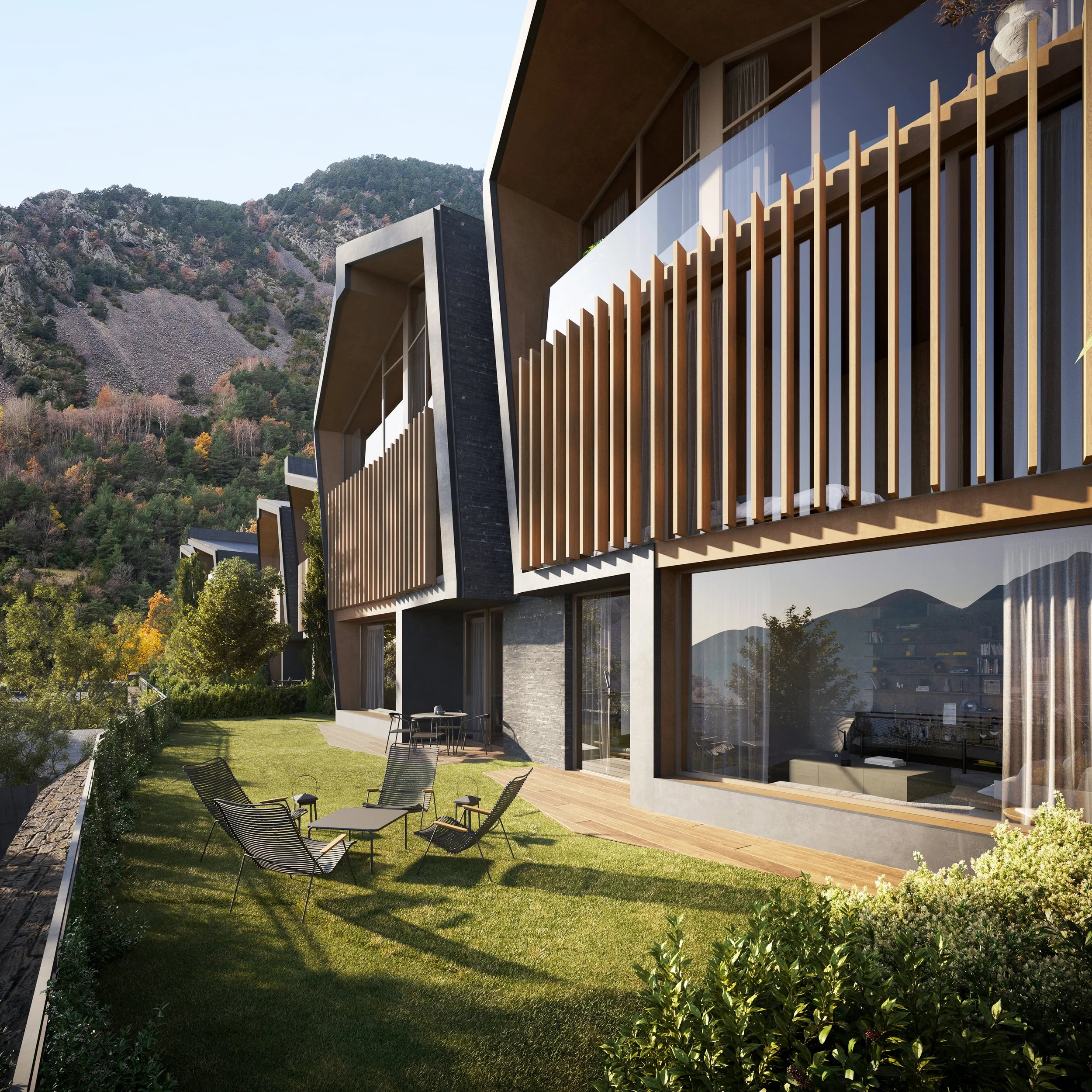 Casa moderna con grandes ventanales, terraza con sillas y mesa exterior, jardín con césped y fondo de montañas y árboles.