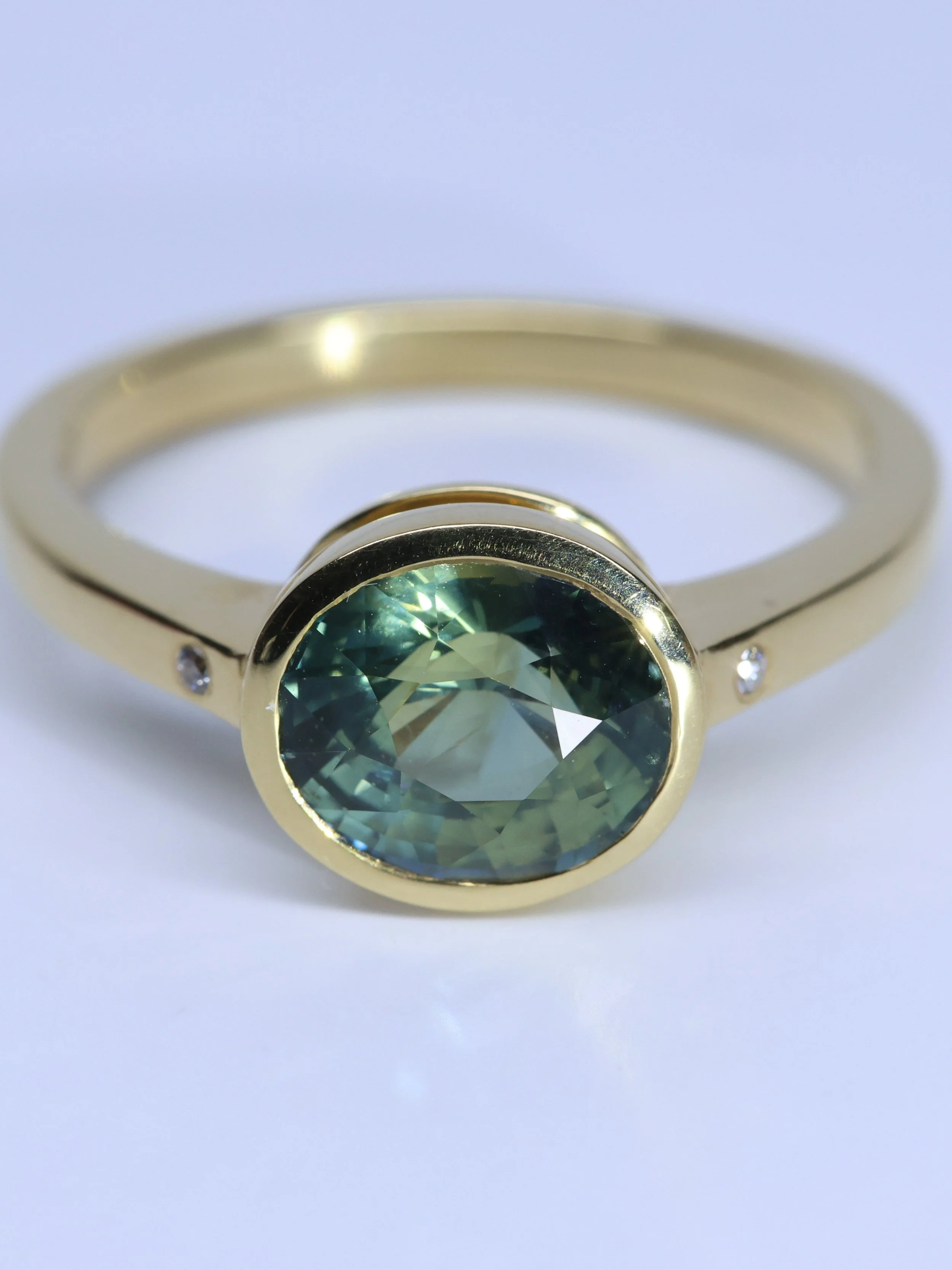 Bi colour sapphire and diamond ring