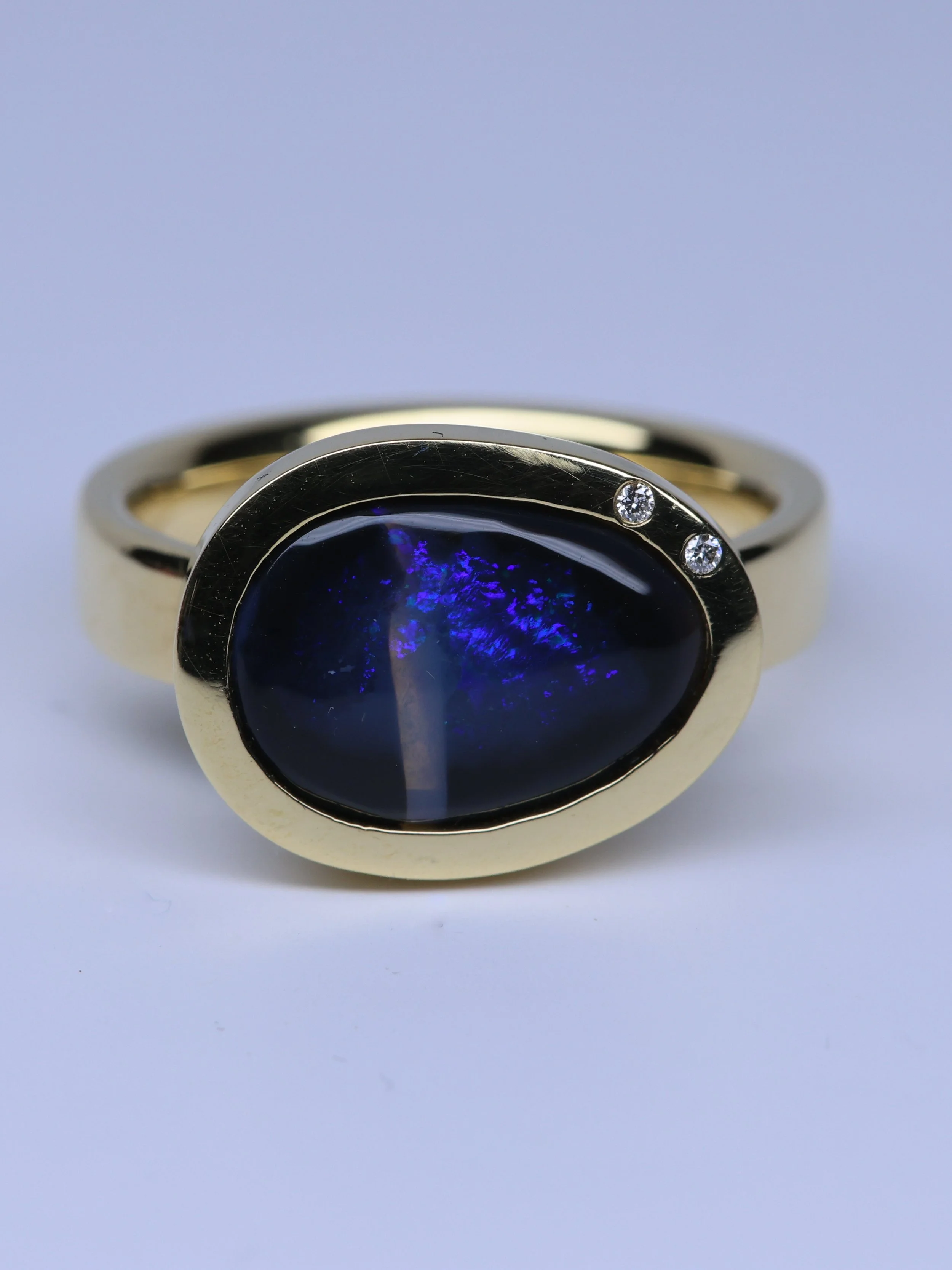 Lightning ridge opal and diamond ring