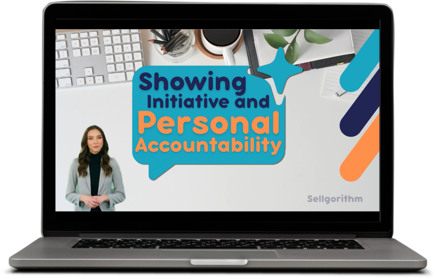A laptop screen displays a presentation slide with text 'Showing Initiative and Personal Accountability'; a woman stands on the slide, and office items like a keyboard, notebooks, and pens are visible.