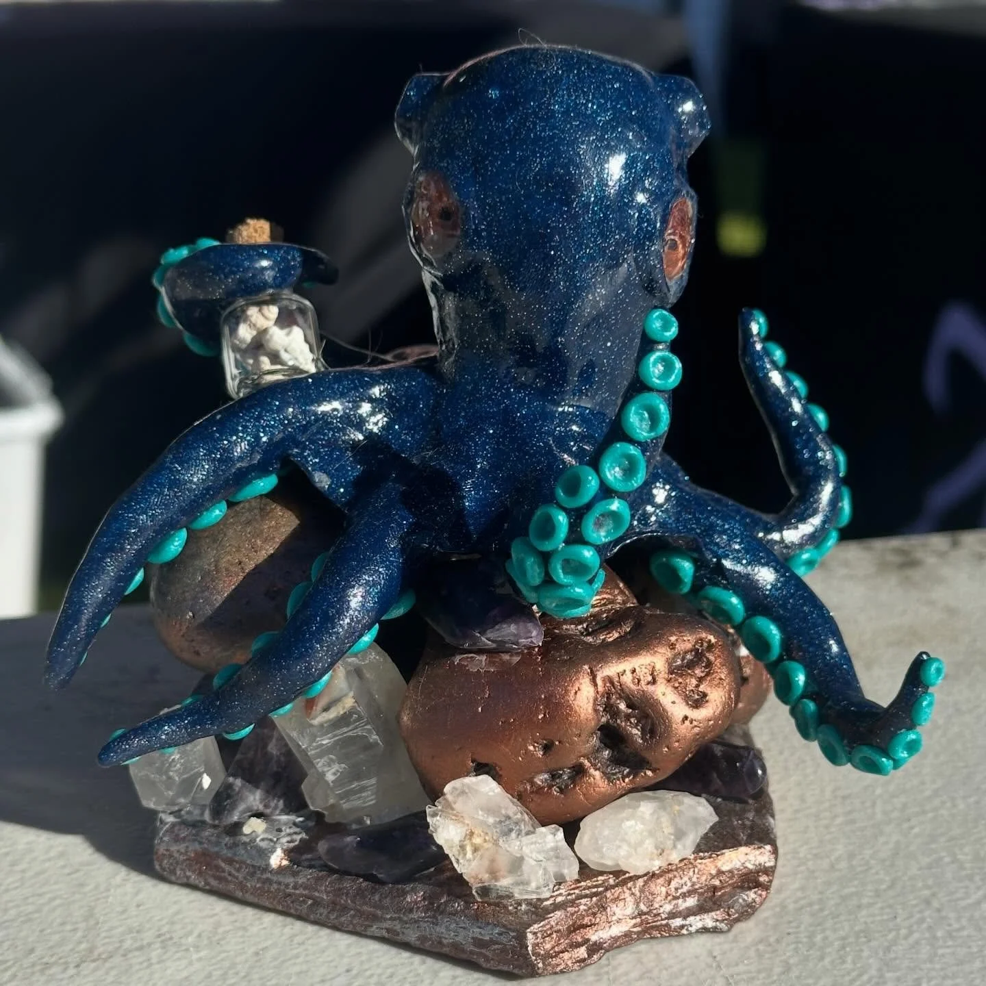Had to get to get a pic of this guy in the sun the other day when i noticed it hit him! Whoops didnt notice the fluff on him aha #sculpture #polymer #fantasy #octopus #handmade