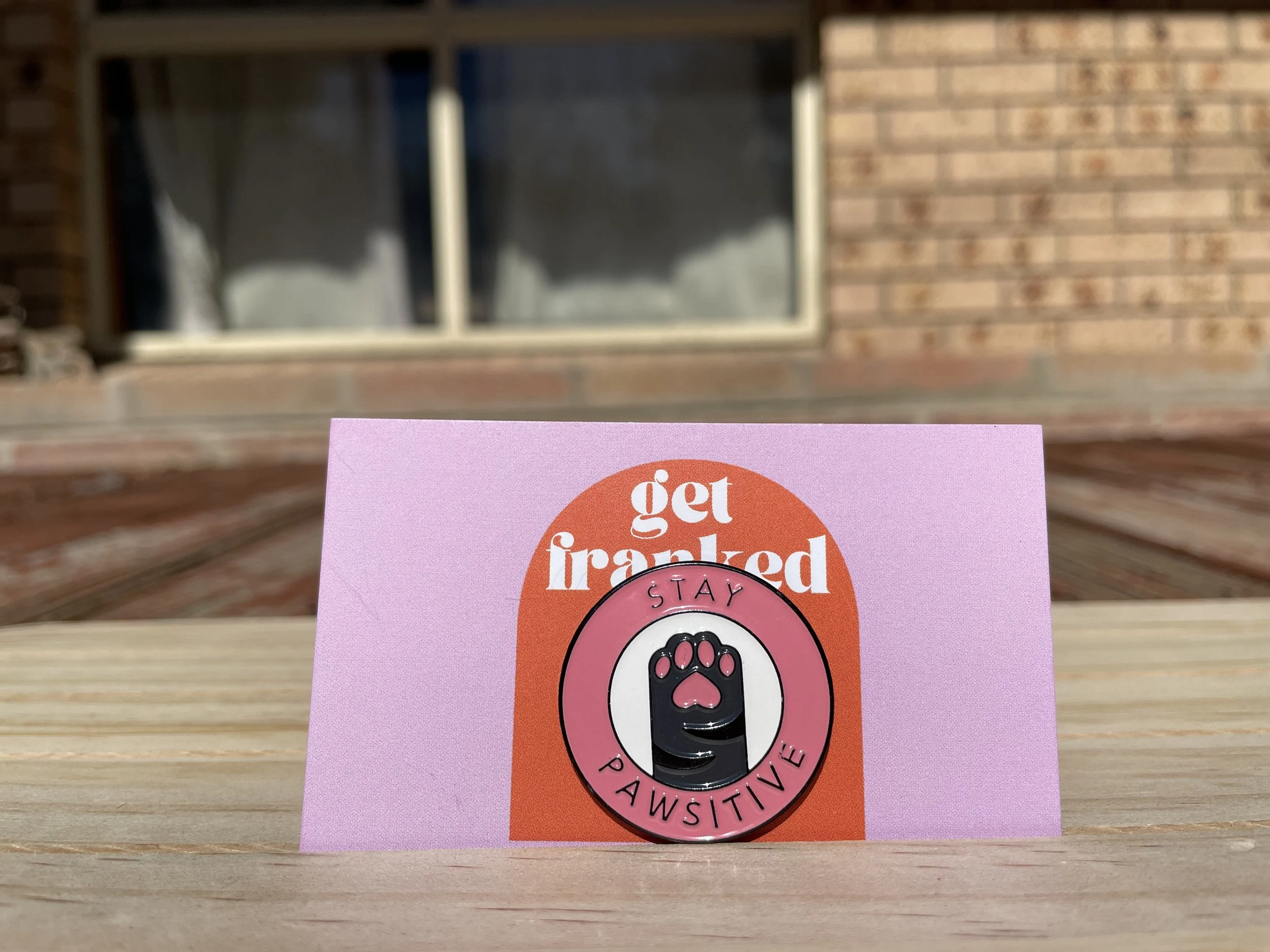 Needle minder: "Stay Pawsitive"