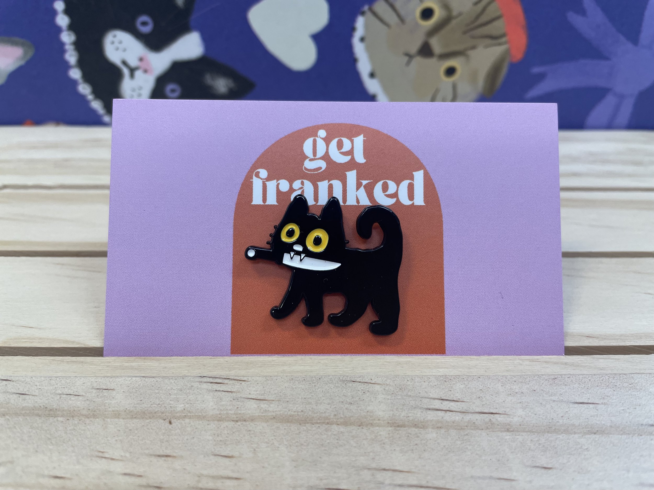 Pin: Black cat with knife