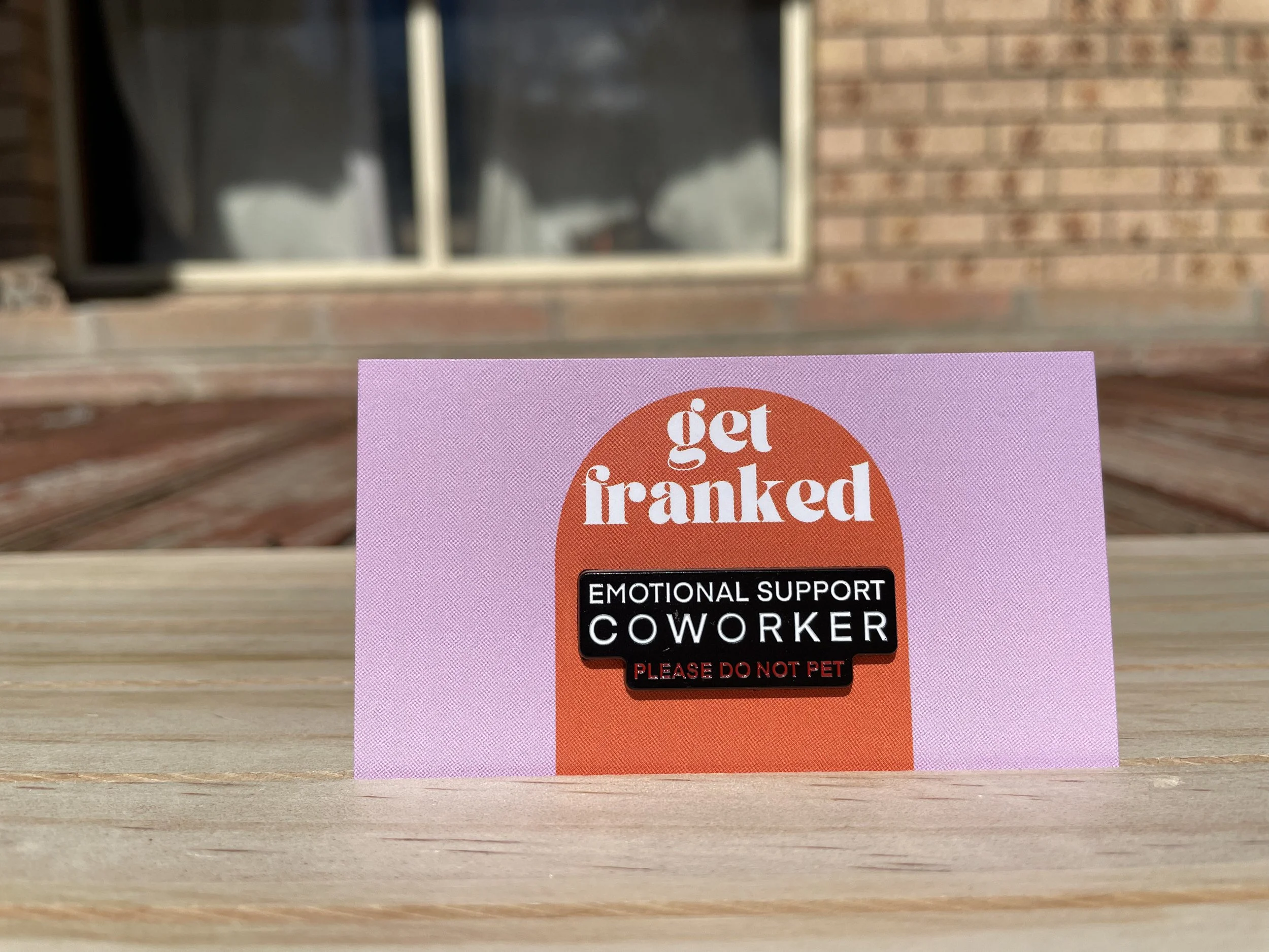 Pin: "Emotional support coworker. Please do not pet"