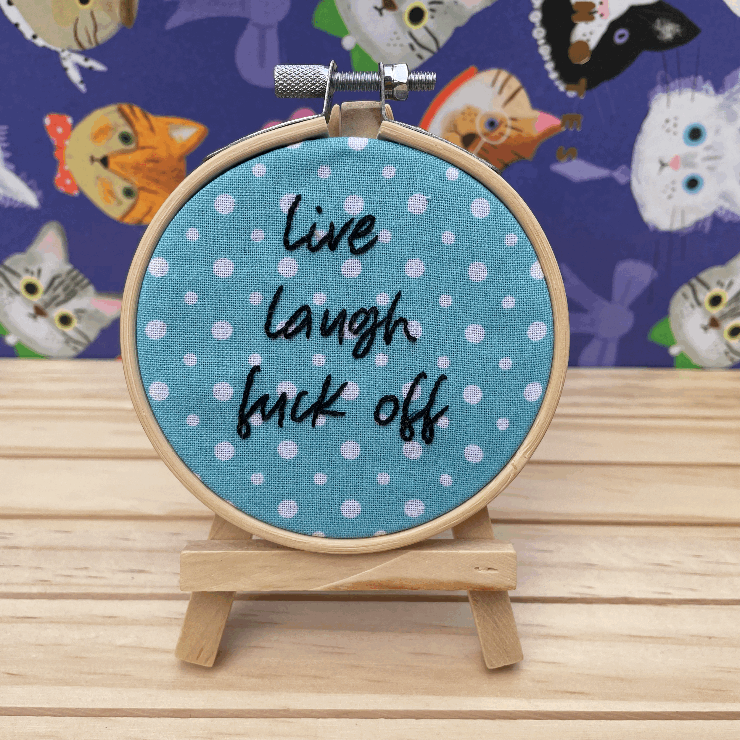 3 inch hoop: "Live laugh f*** off"