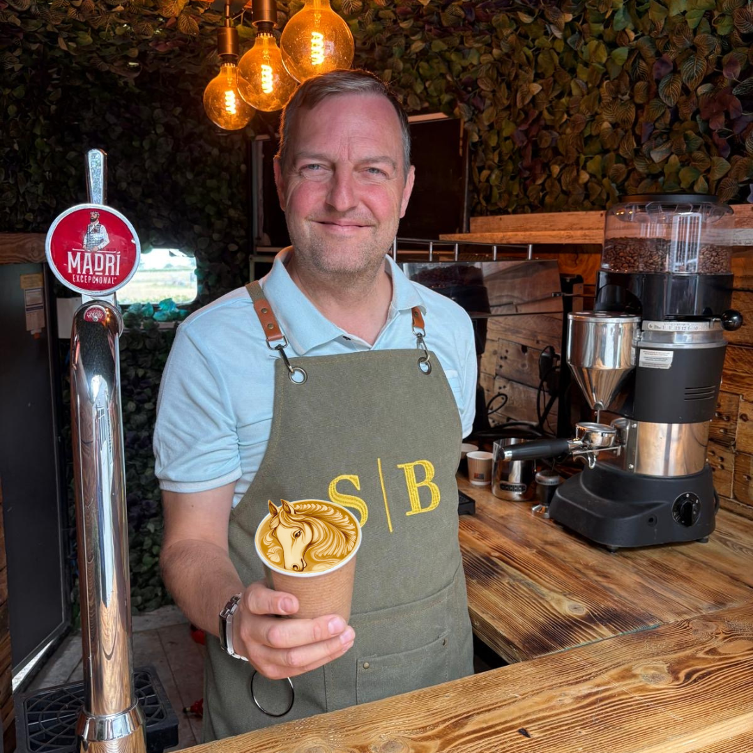 Service with a smile, with coffee and wine from our converted horsebox