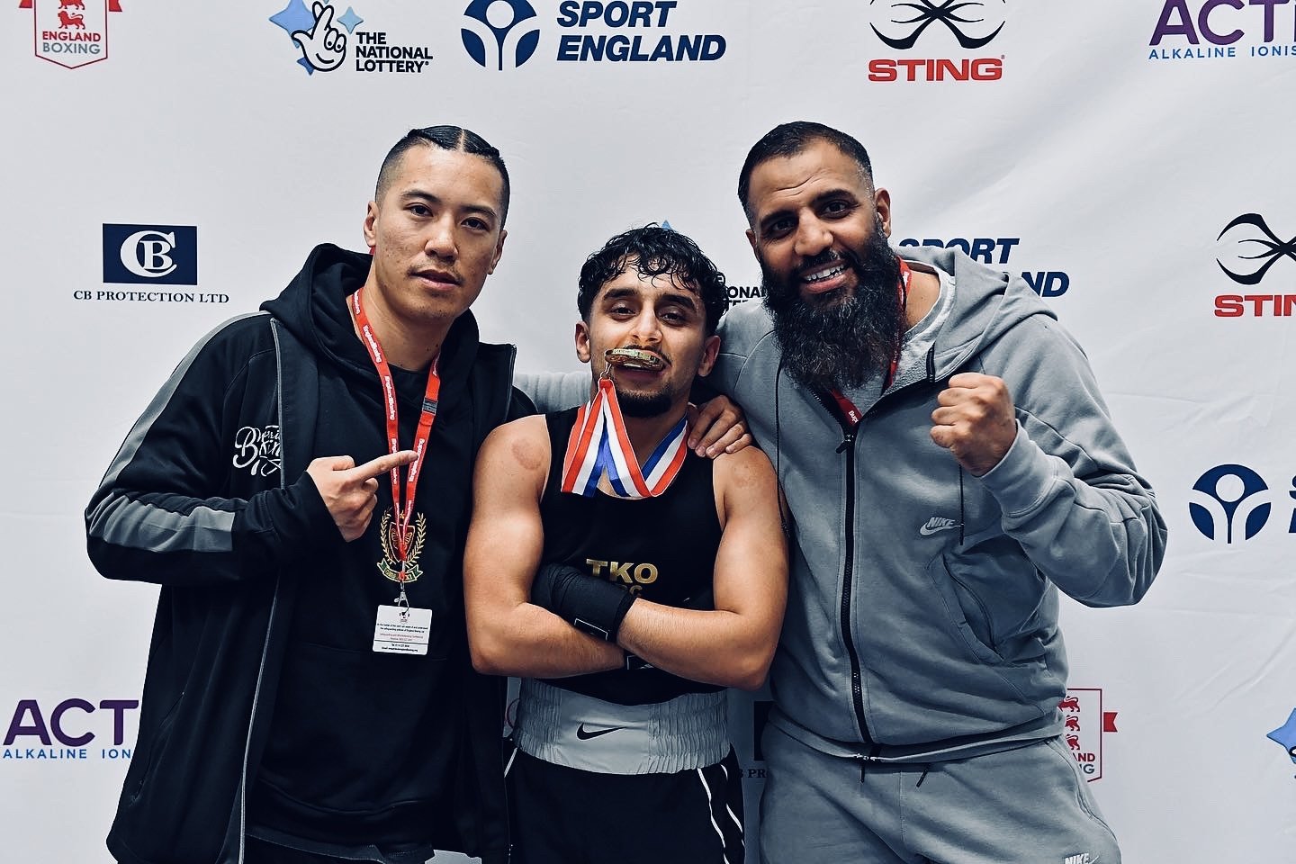 Steve Iron coach with fighter after winning National amateur boxing title.
