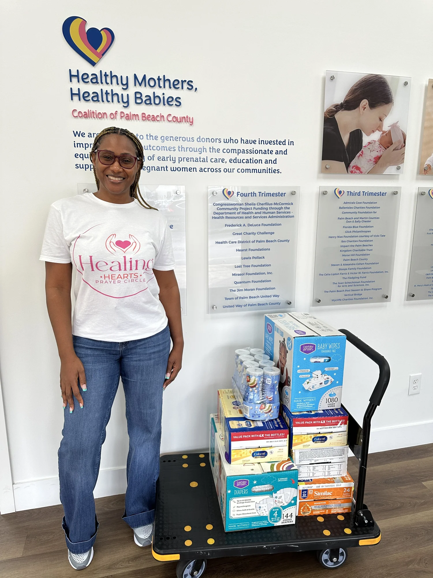 Board members supporting Healthy Mothers Healthy Babies Coalition of West Palm Beach through community donations