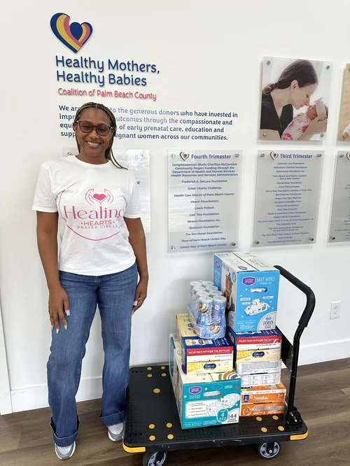 Board members donating to Healthy Mothers Healthy Babies Coalition of West Palm Beach