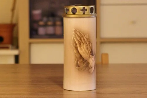 Reinigung mit gesegneter Kerze