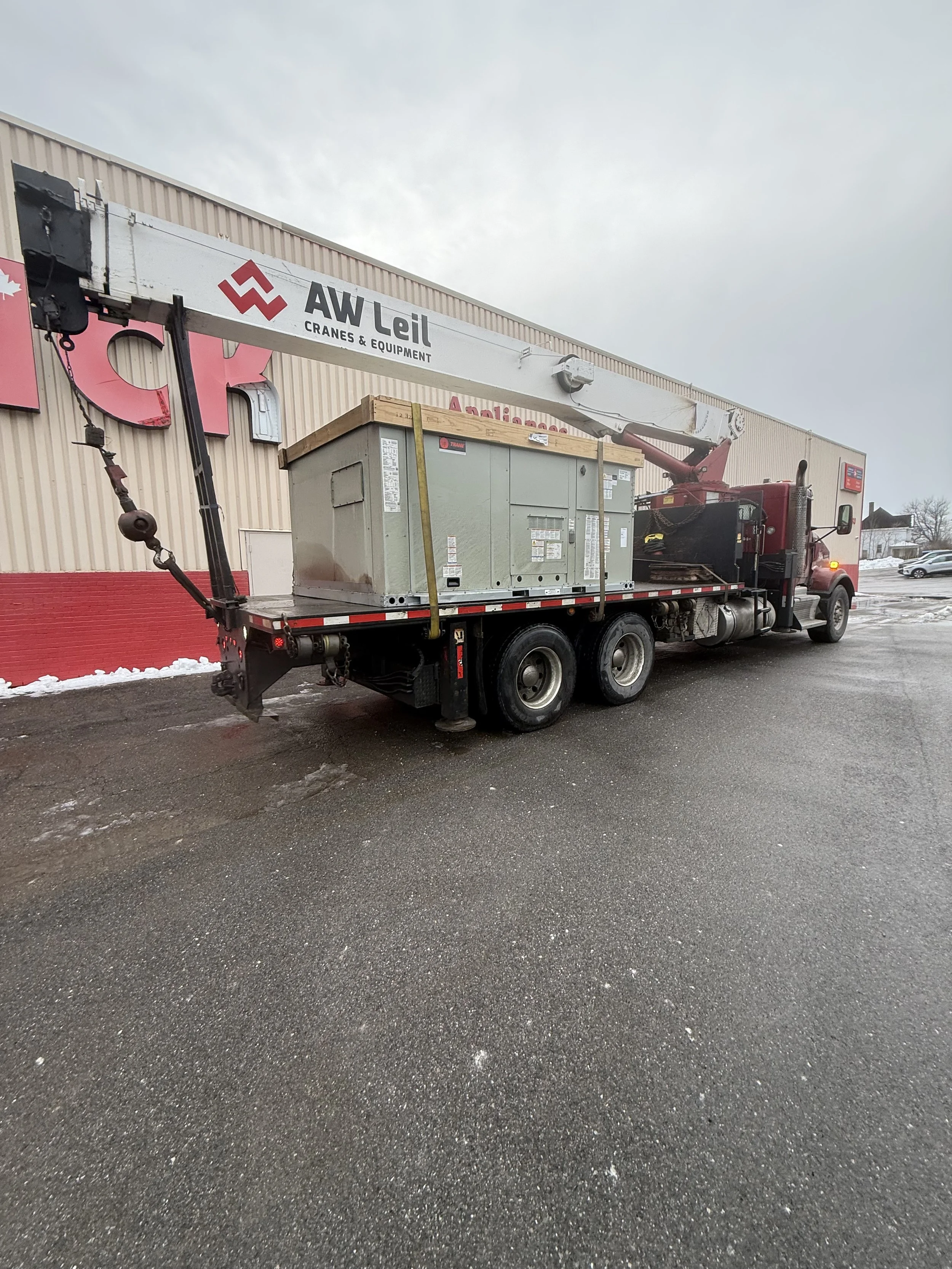 Rooftop Unit on Crane Truck | Air Energy Solutions.jpeg