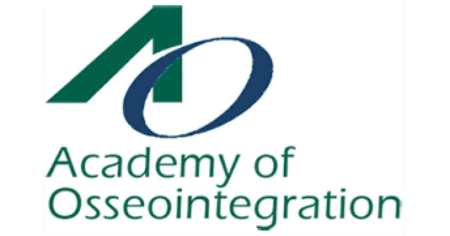 Logo for the Academy of Osseointegration, featuring a stylized upward arrow, a blue circle, and text.