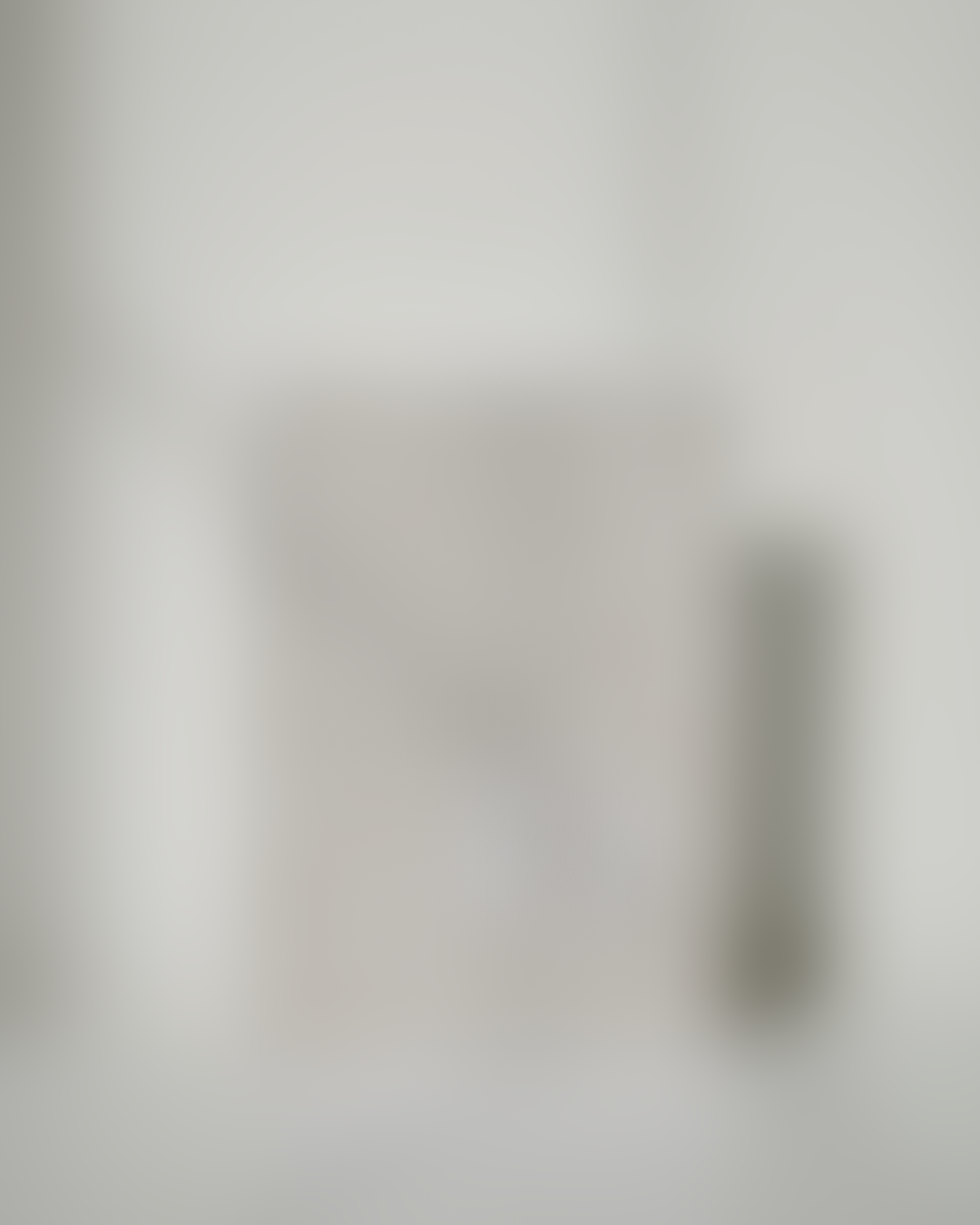 A blurred image with indistinct objects.