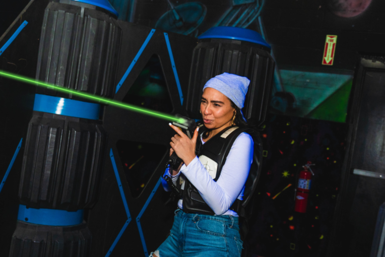 Adult Lady Playing Phaser force laser tag