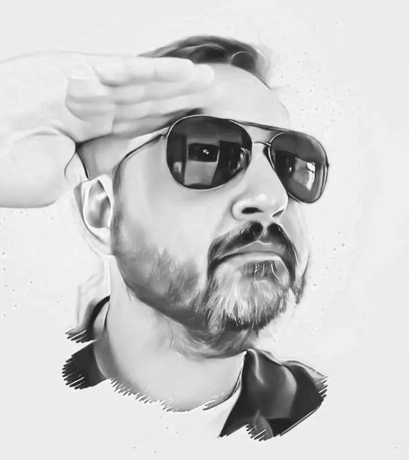 A black and white illustration of a man with sunglasses, a beard, and a mustache, saluting with his right hand, wearing a shirt.