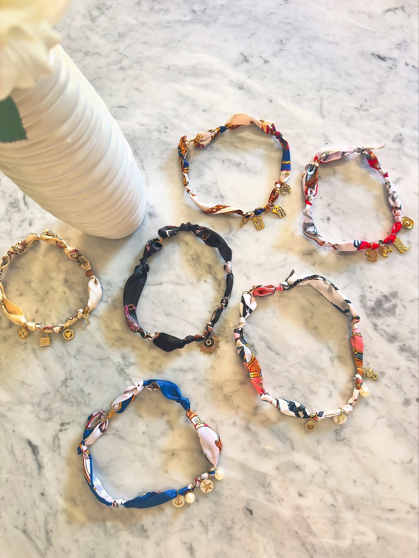 Summer&rsquo;s here and so is the ultimate accessory✨ 
Meet our new scarf necklace collection: Trending now! Shop now link in bio

#ScarfNecklace #summerstyle #newcollection