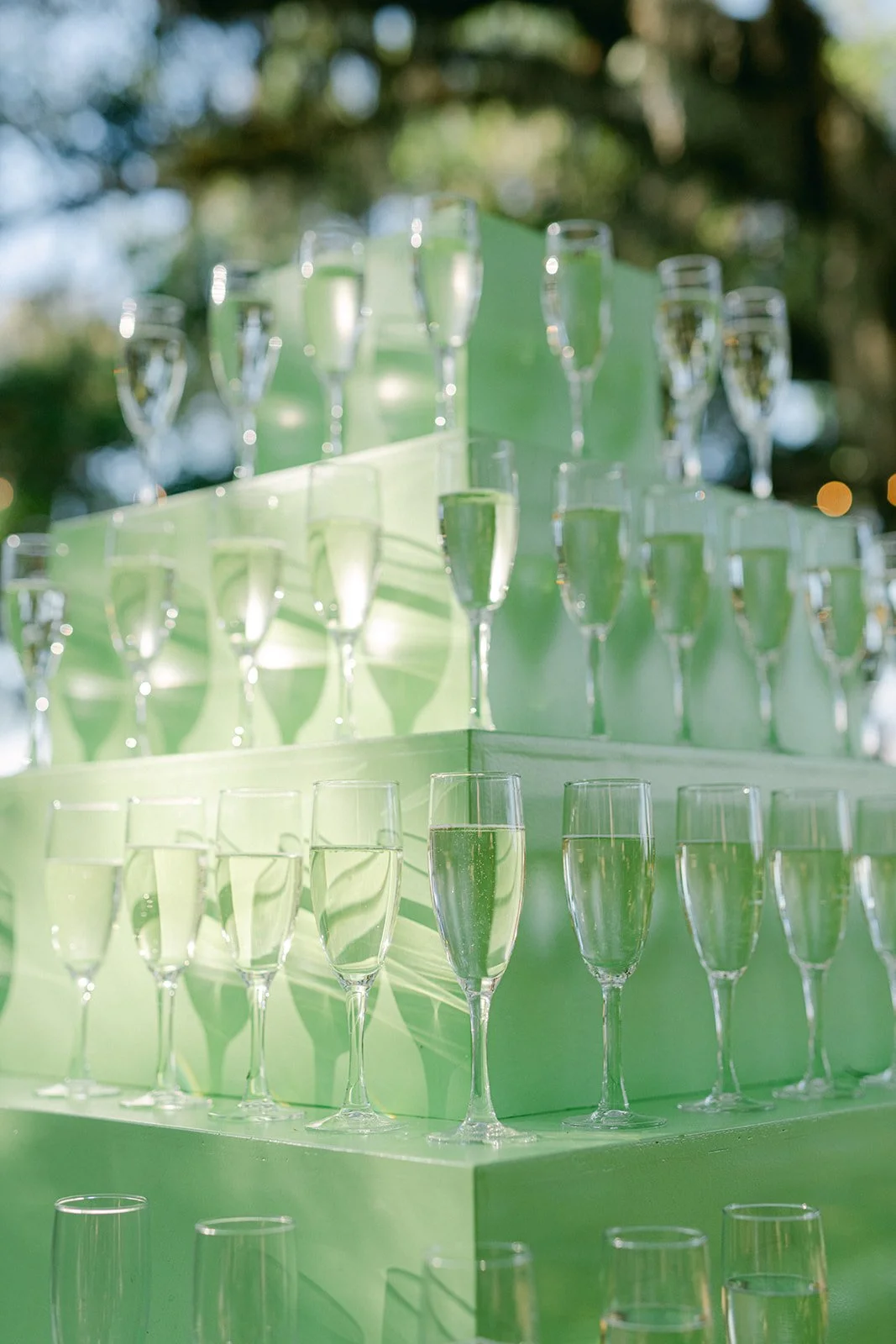 outdoor-wedding-champagne-tower-mint-green-tiered-display-wedding-planner-tampa.jpg