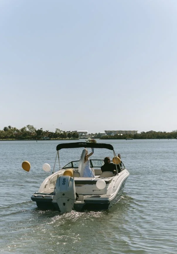 bride-groom-boat-exit-florida-waterway-tampa-wedding-planner.jpg
