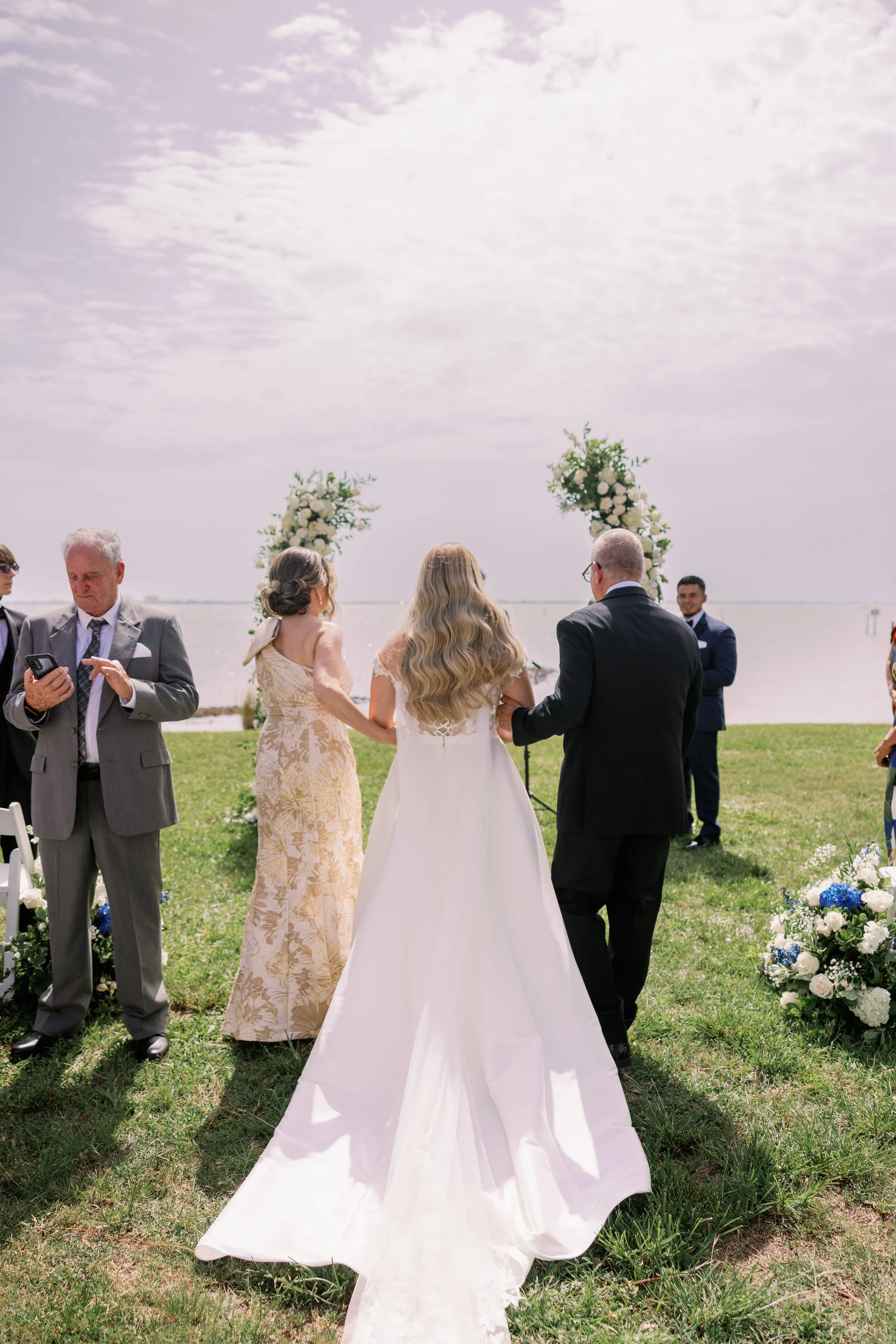 bride-candid-walking-motion-dress-lawn-powel-crosley-estate-wedding-sarasota.jpg