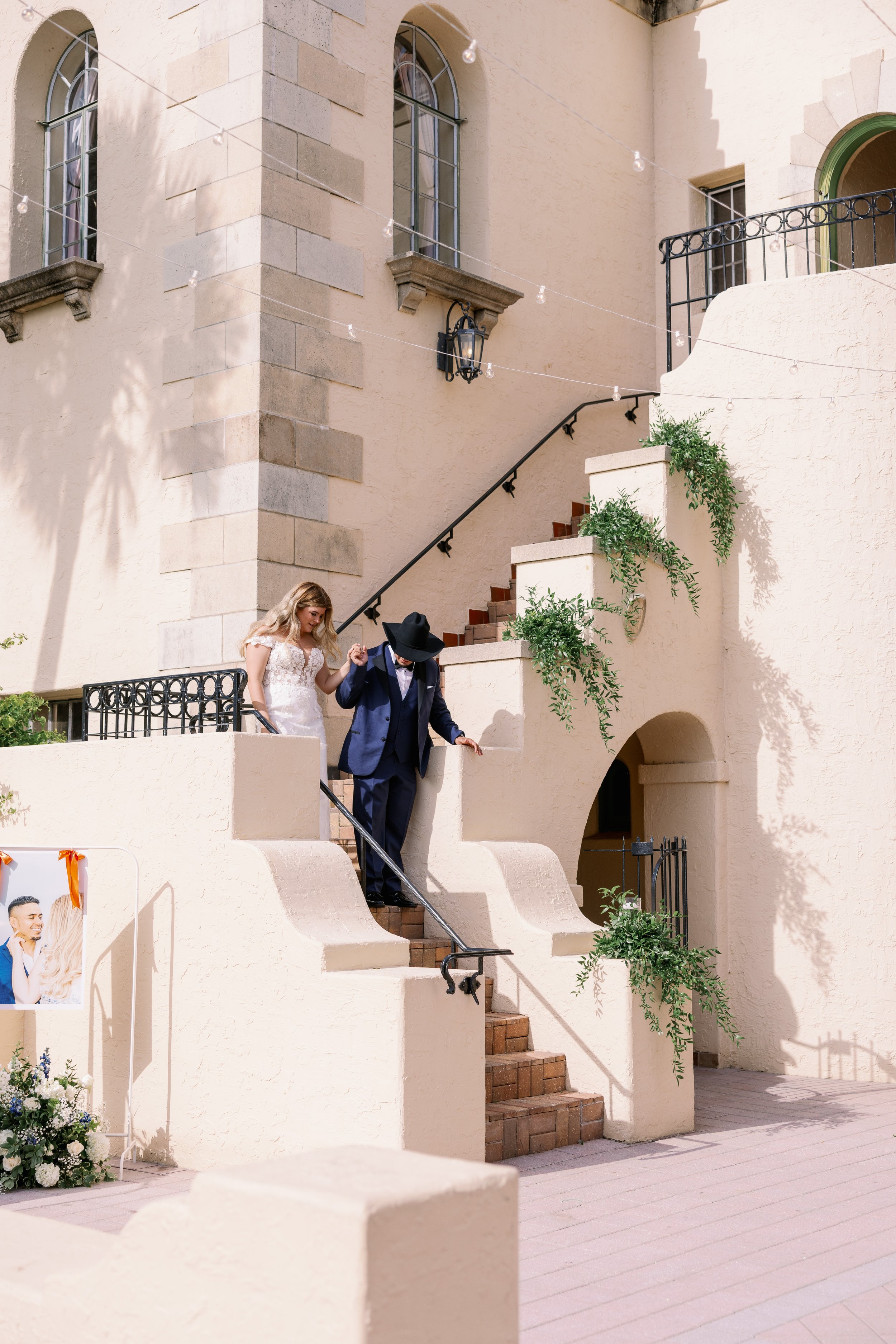 bride-groom-candid-staircase-moment-powel-crosley-estate-wedding-sarasota.jpg