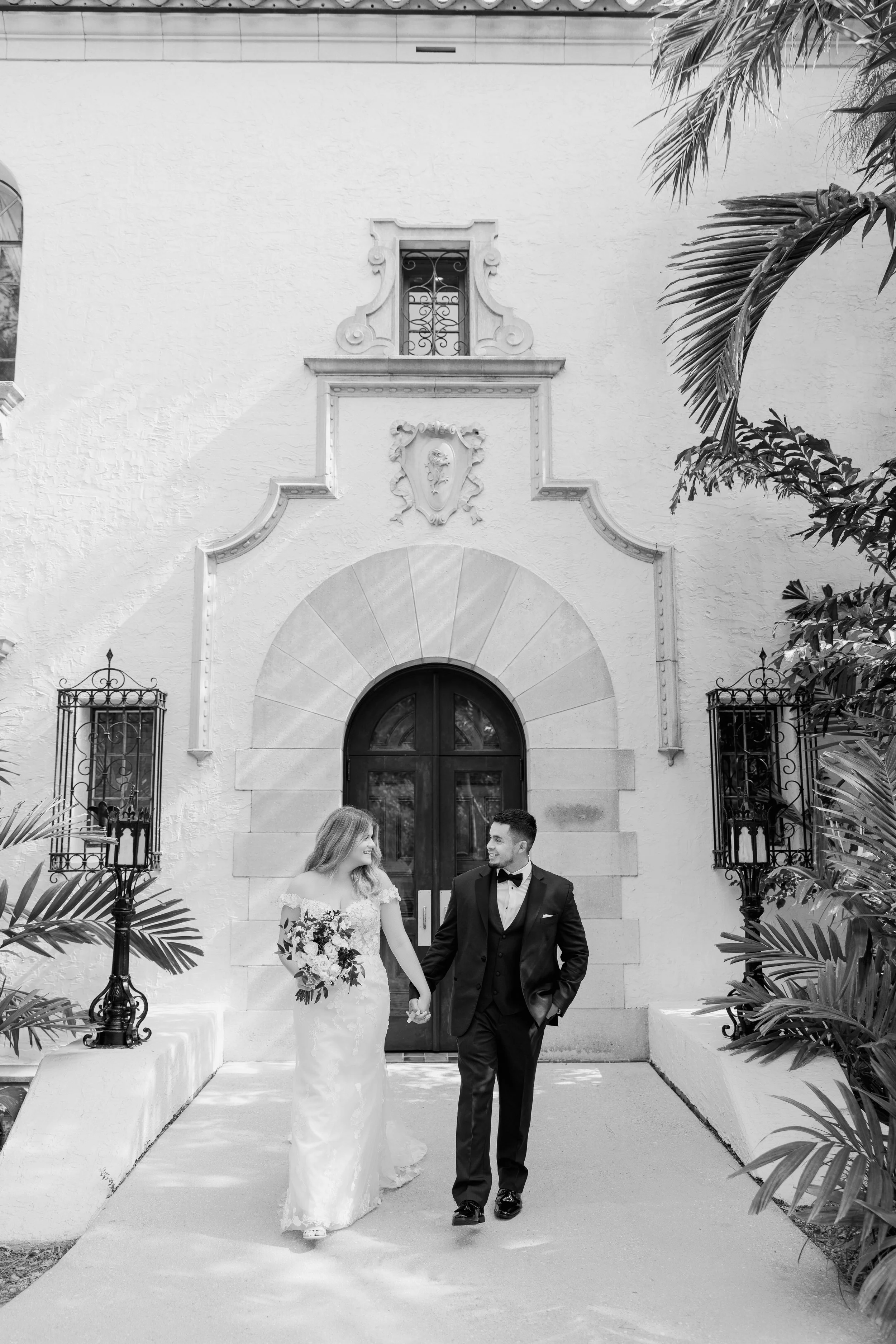 bride-groom-full-length-portrait-doorway-black-and-white-powel-crosley-estate-wedding-sarasota.jpg