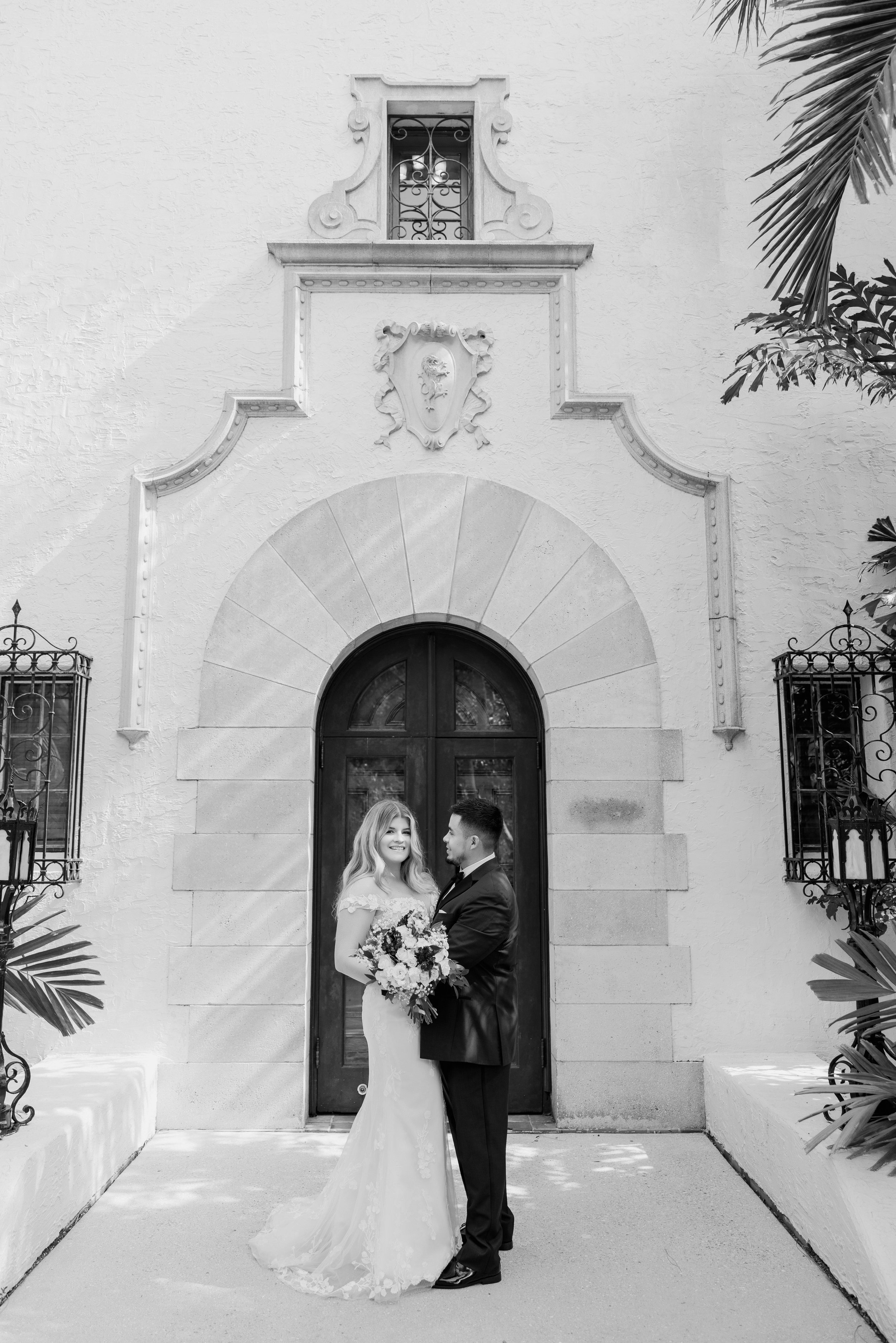 bride-groom-portrait-doorway-black-and-white-powel-crosley-estate-wedding-sarasota.jpg