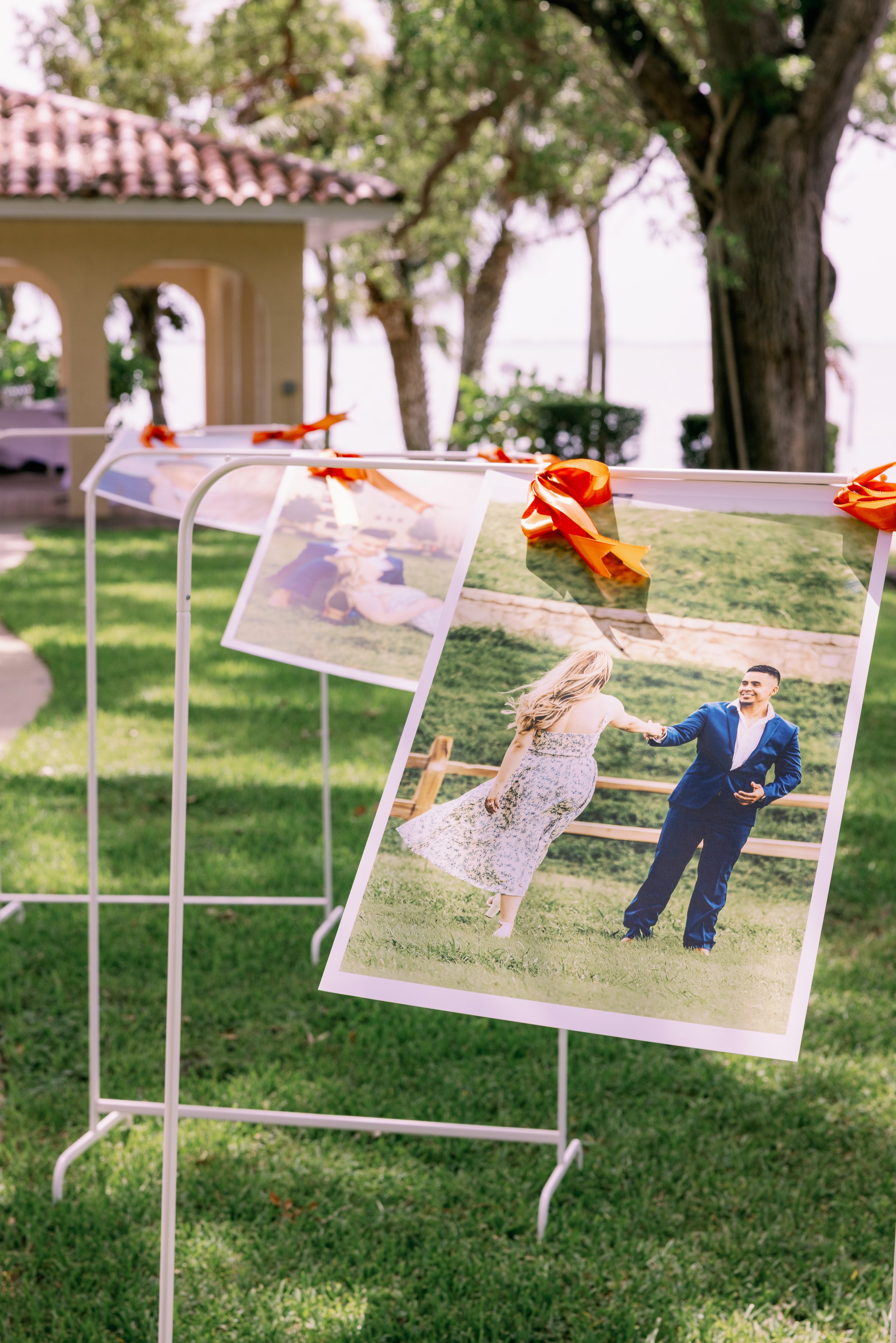 wedding-photo-display-rack-reception-decor-powel-crosley-estate-wedding-sarasota.jpg