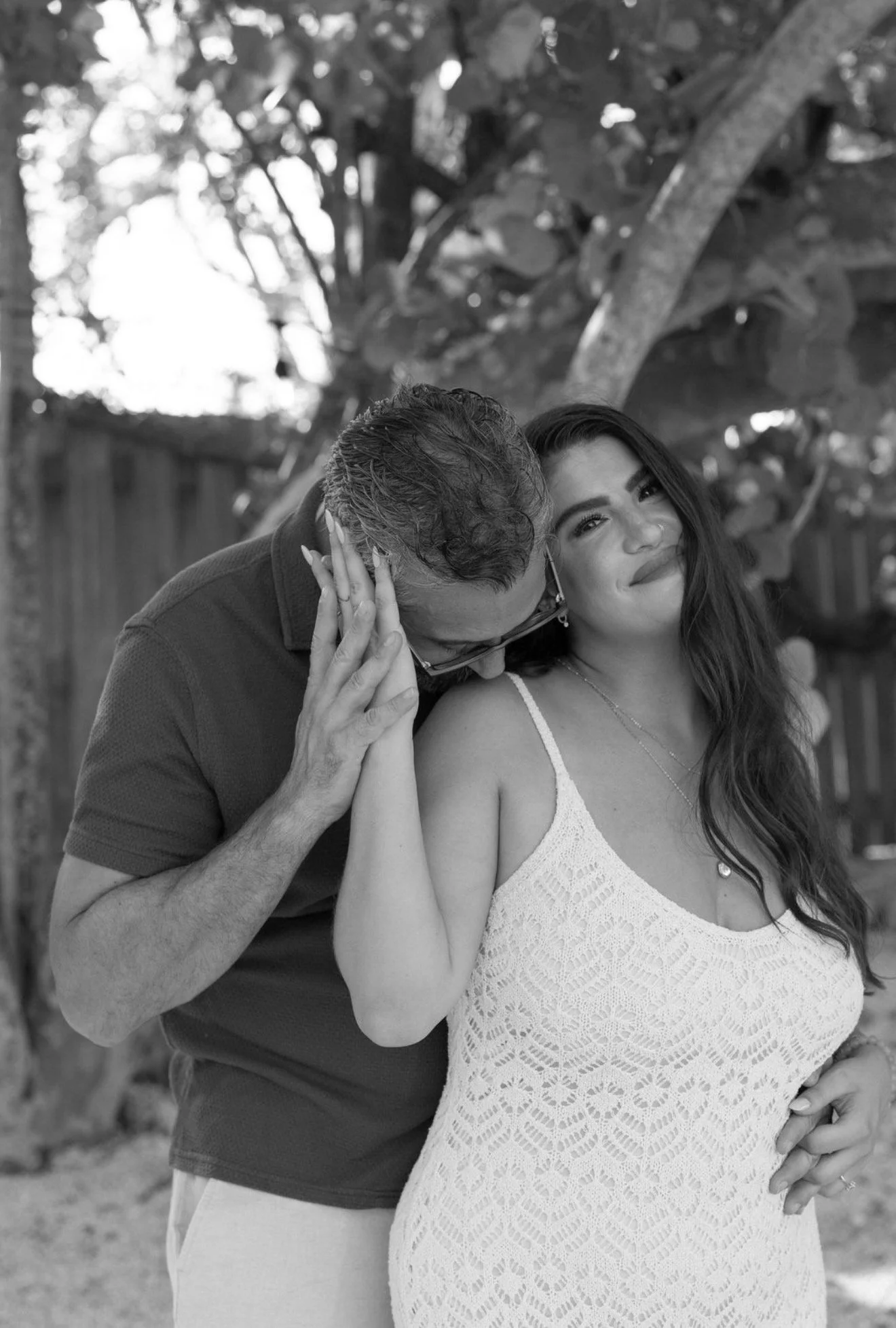 couple-forehead-kiss-portrait-anna-maria-island-wedding-weekend.png