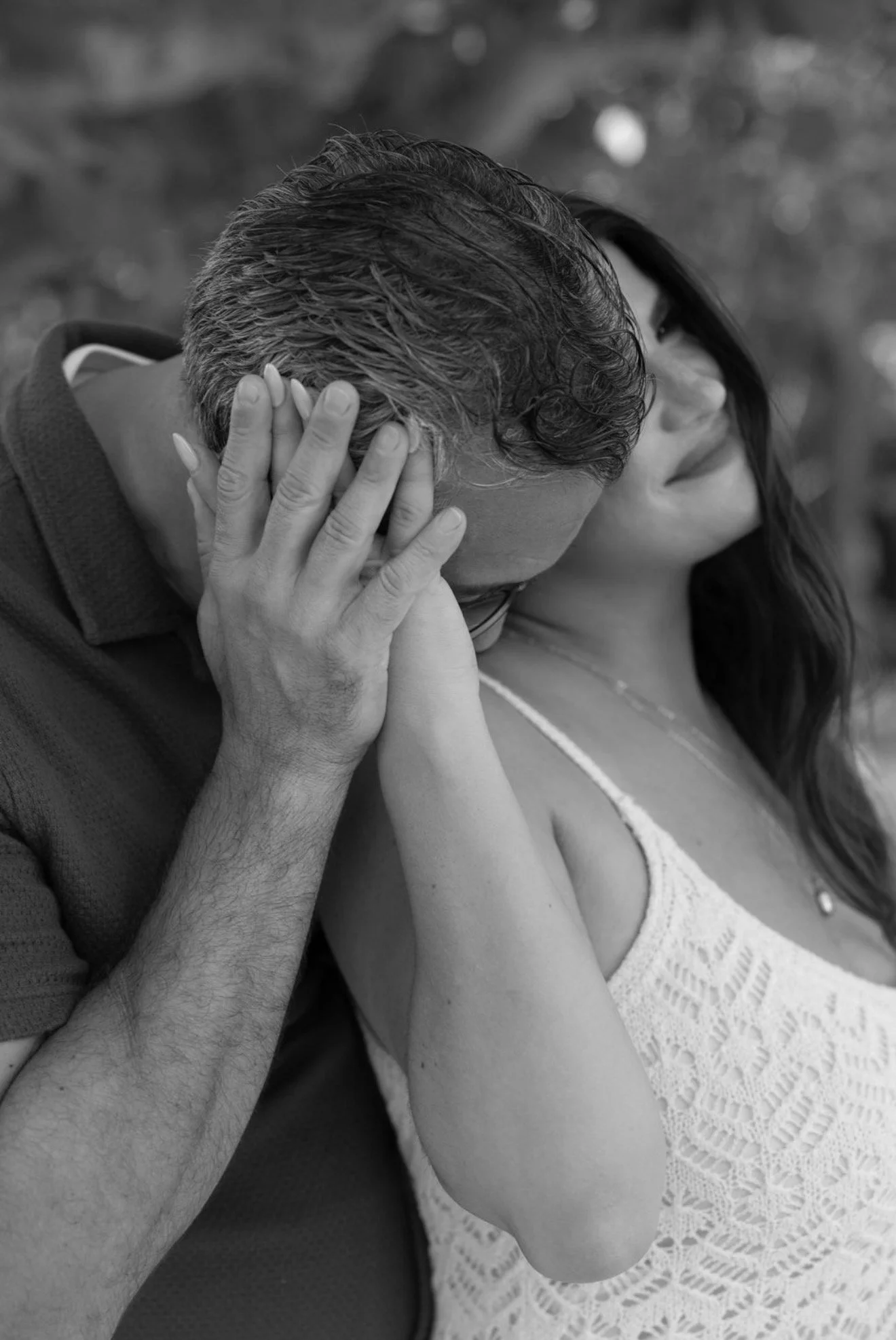 couple-forehead-touch-black-and-white-anna-maria-island-wedding-weekend.png