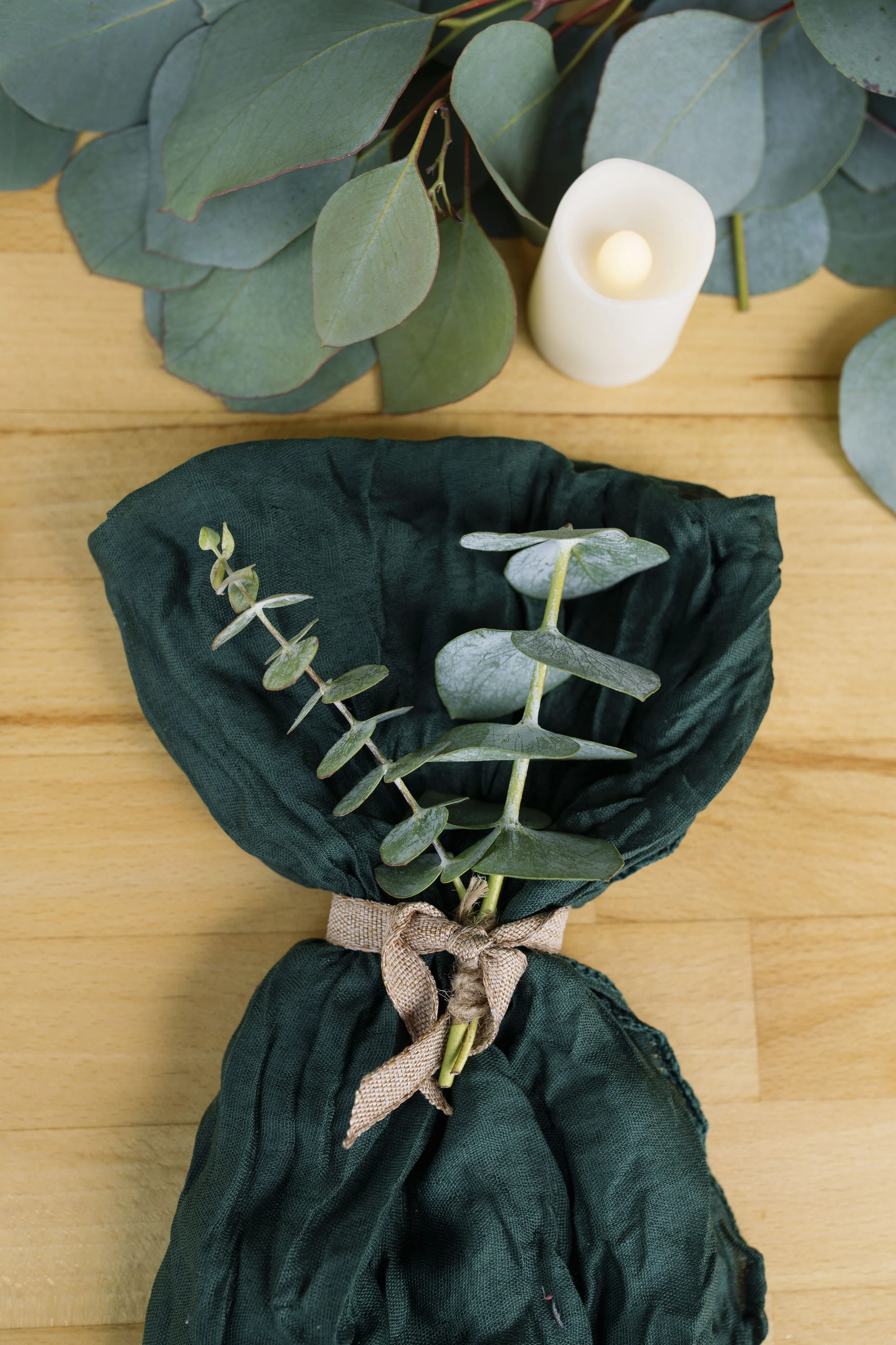 napkin-ribbon-eucalyptus-detail-candle-mar-vista-dockside-welcome-dinner-wedding.jpg