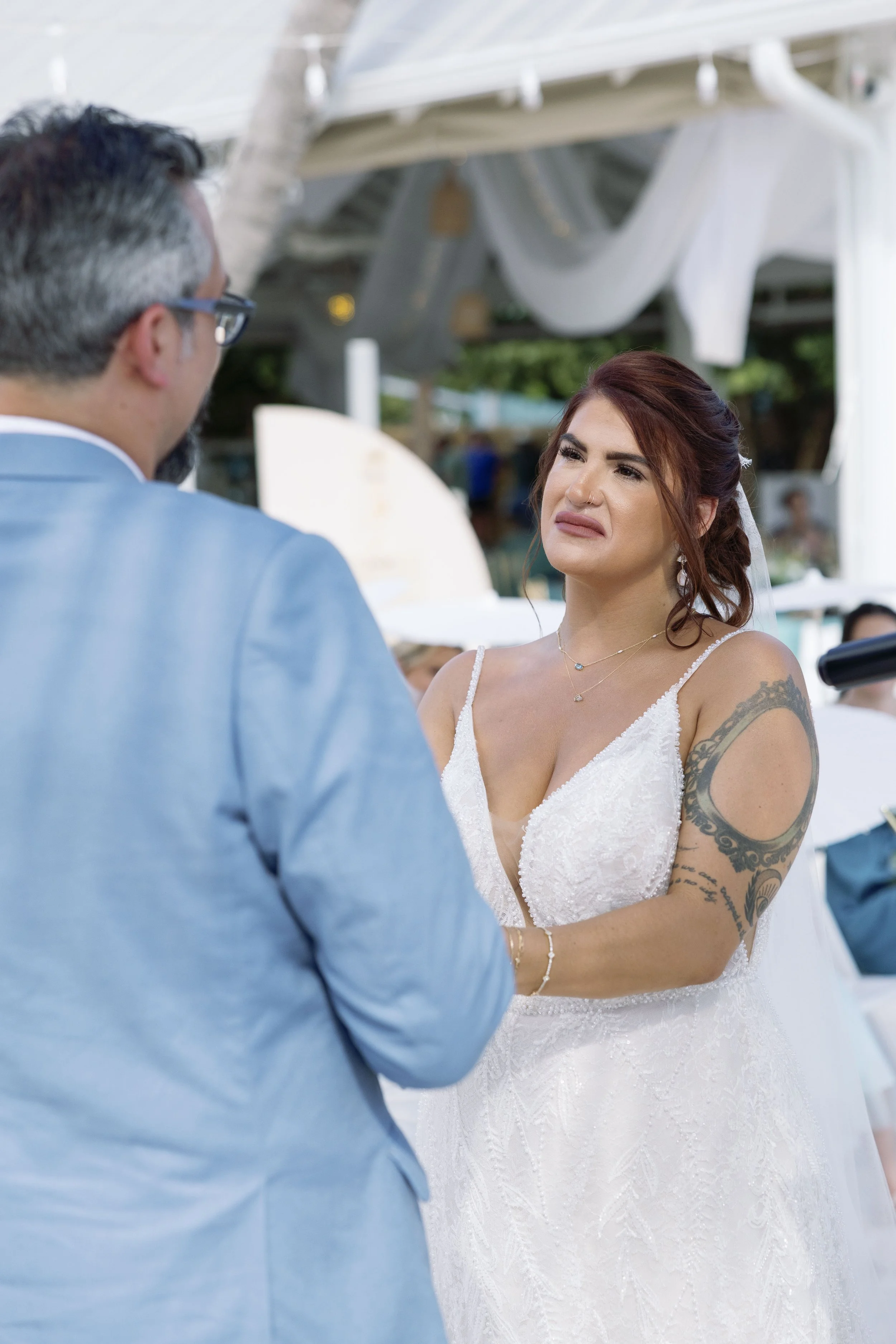 bride-groom-close-moment-outdoor-patio-grand-pavilion-sandbar-wedding.jpg