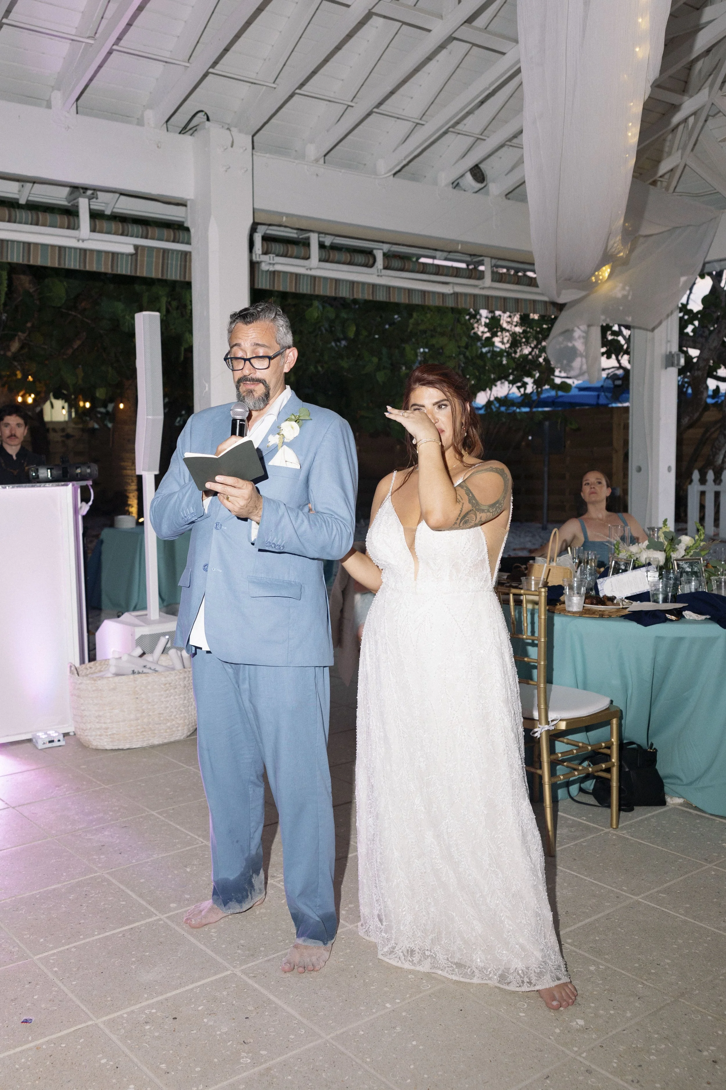 bride-groom-grand-entrance-reception-guests-grand-pavilion-sandbar-wedding.jpg
