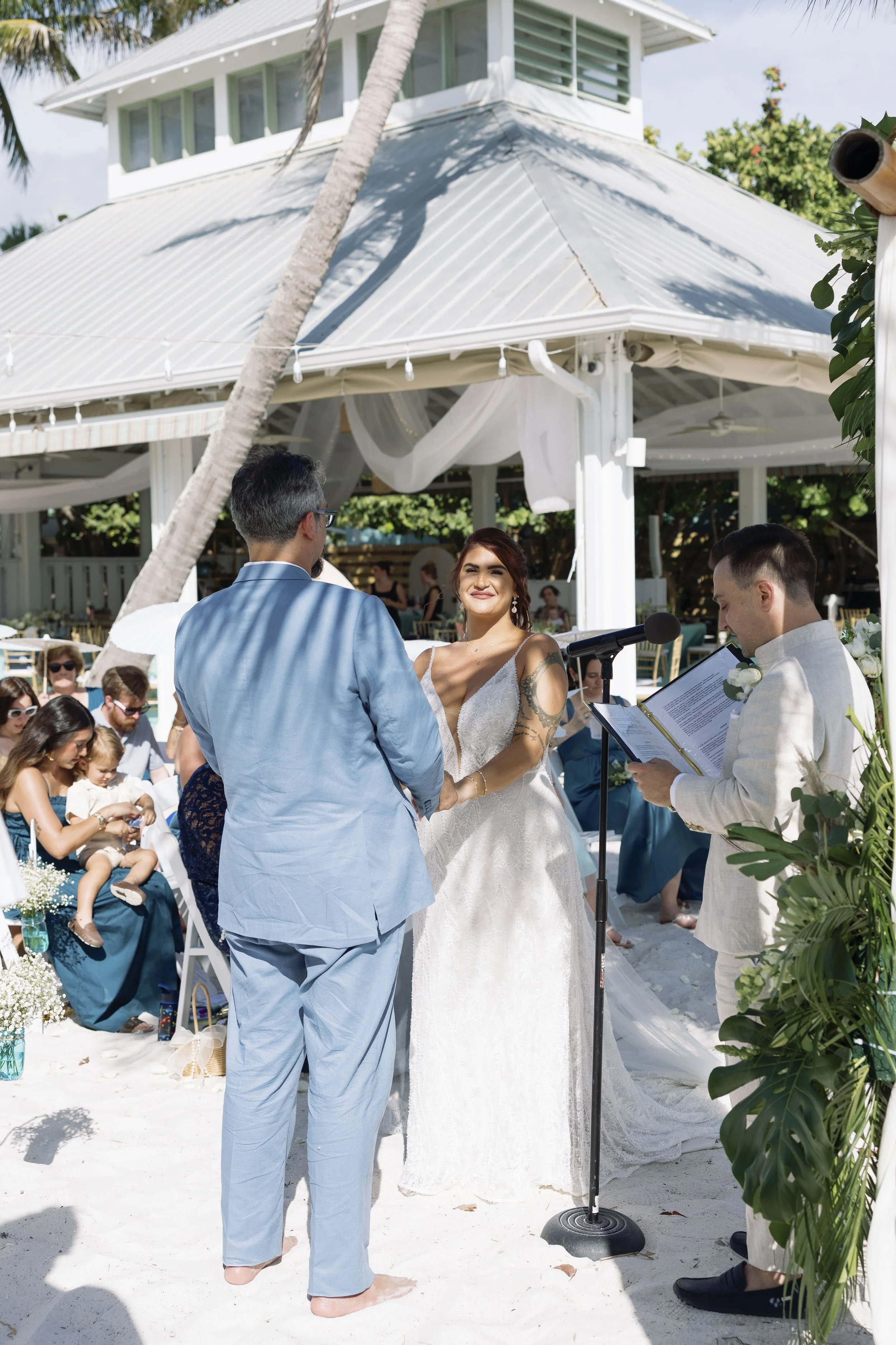 ceremony-wide-shot-officiant-guests-gazebo-grand-pavilion-sandbar-wedding.jpg