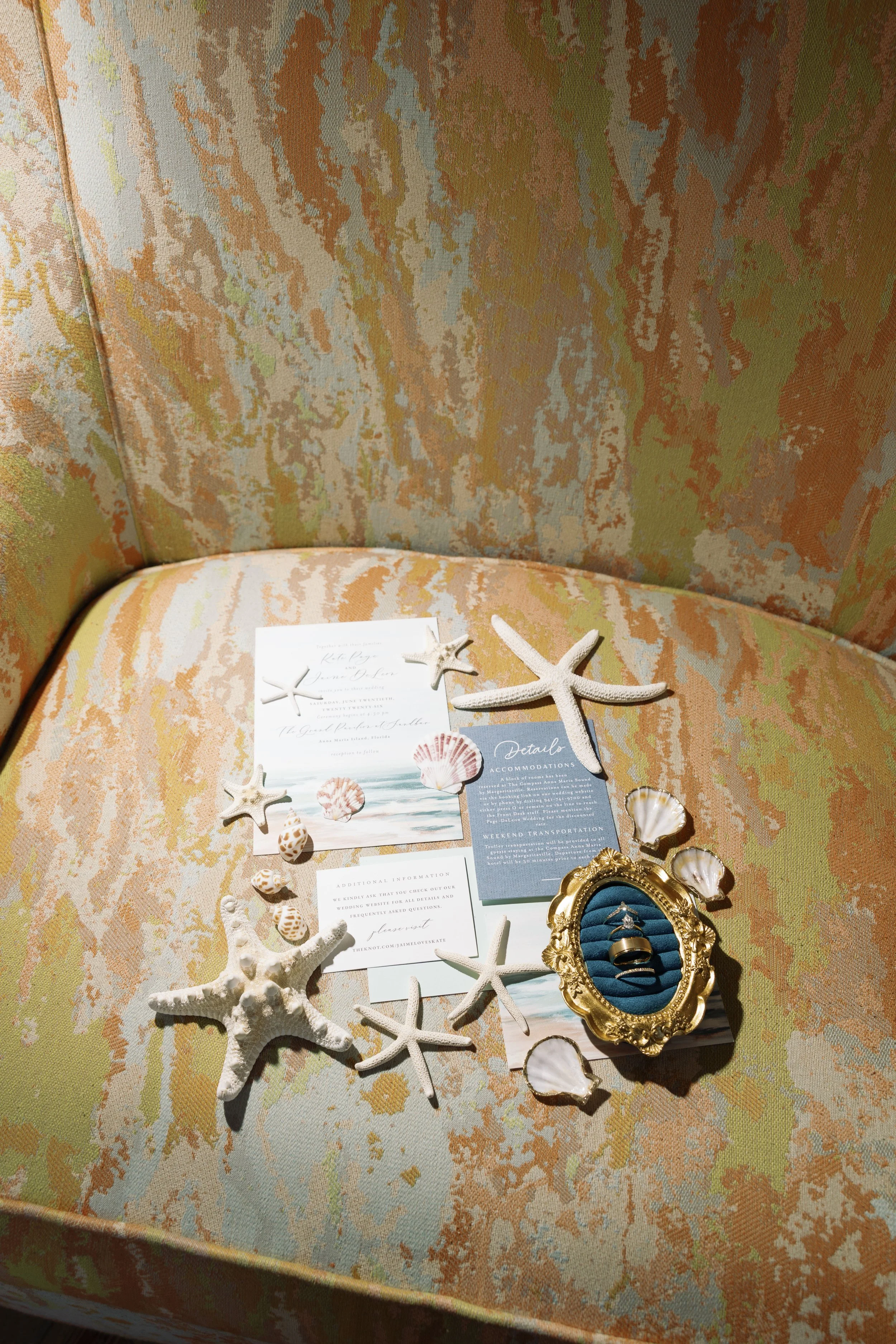 invitation-suite-starfish-shells-detail-flatlay-anna-maria-island-wedding.jpg