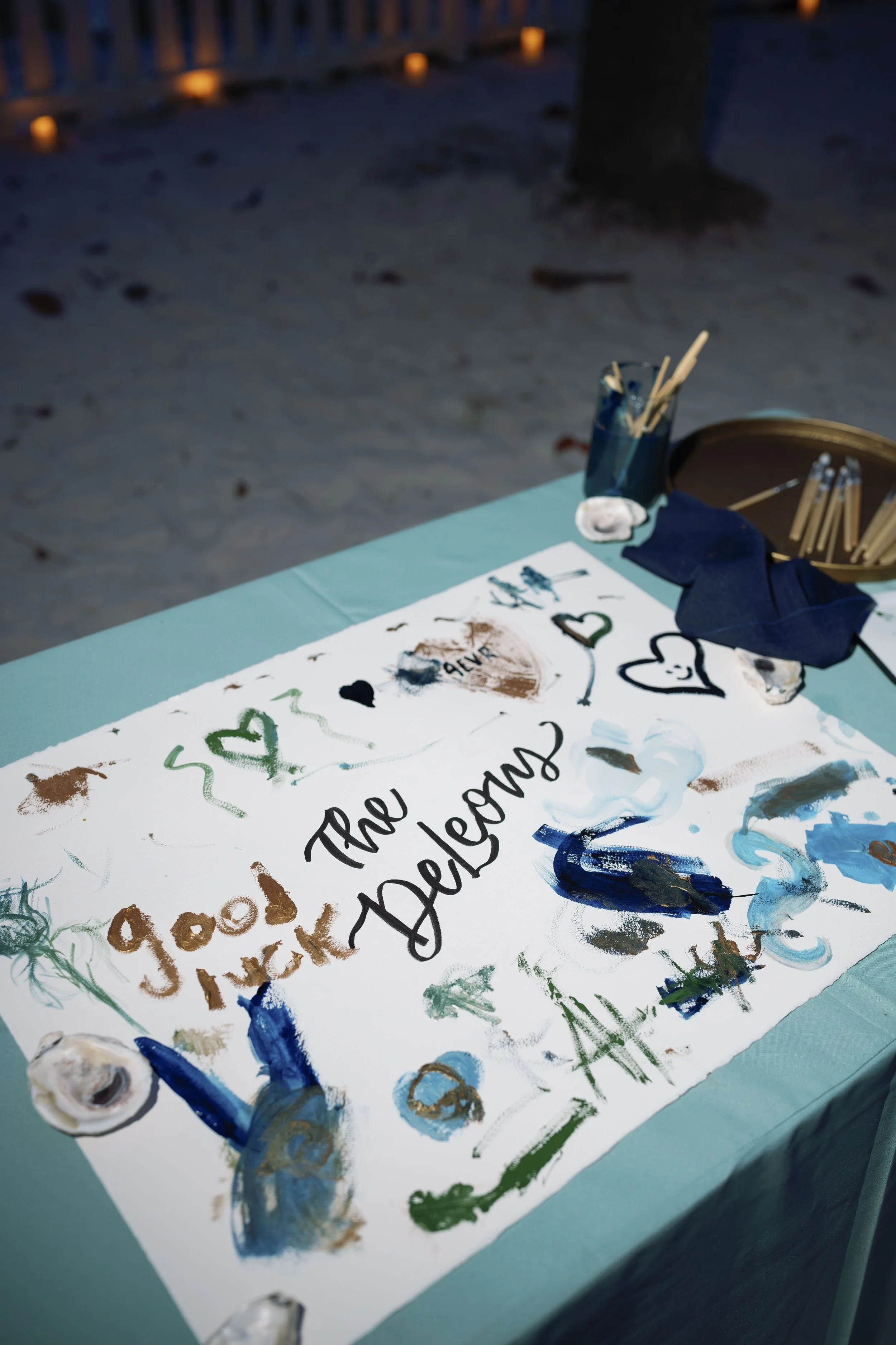 message-in-a-bottle-guest-book-signage-grand-pavilion-sandbar-anna-maria-island-wedding.jpg