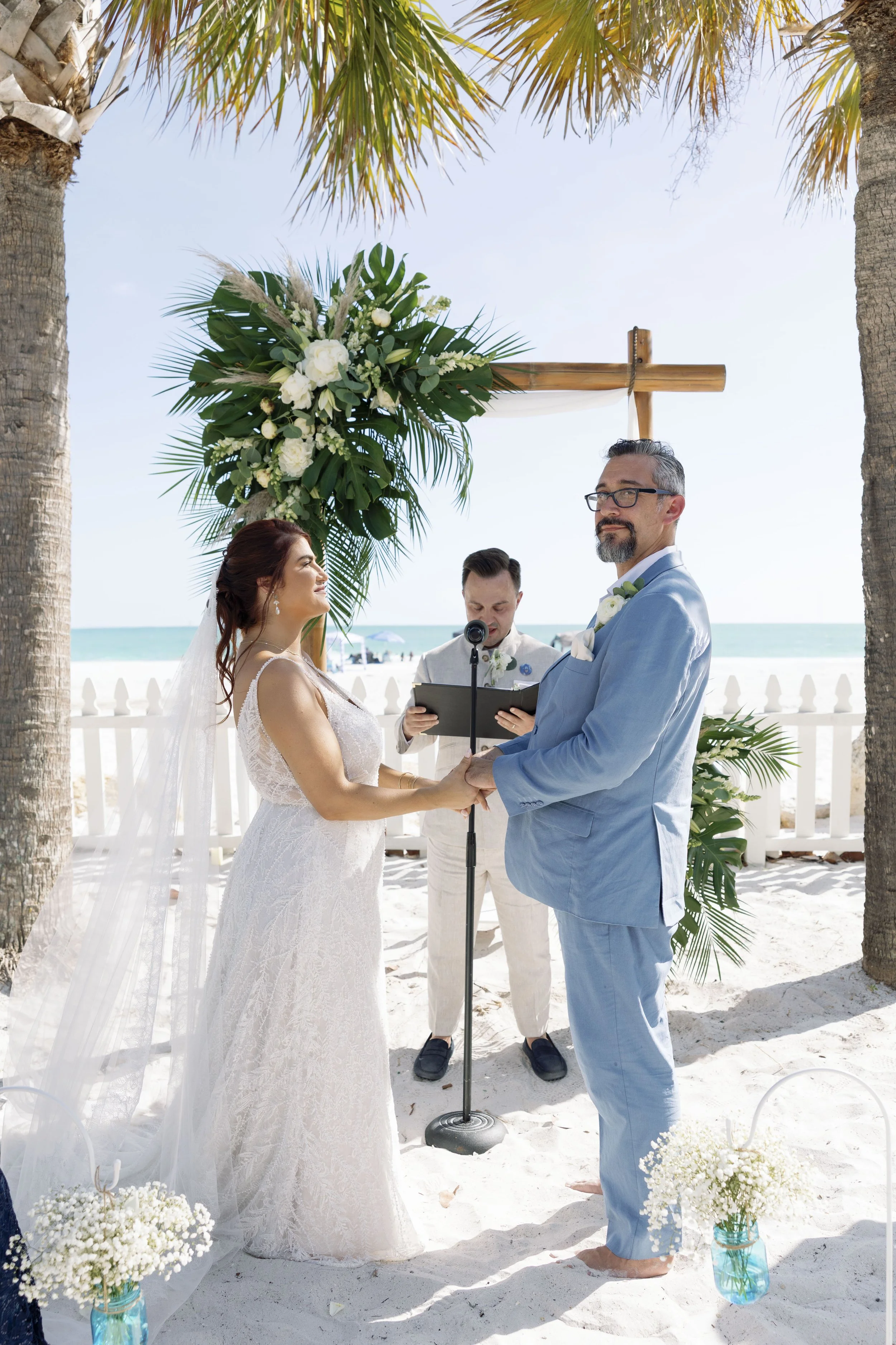 officiant-beach-ceremony-wide-shot-grand-pavilion-sandbar-anna-maria-island-wedding.jpg