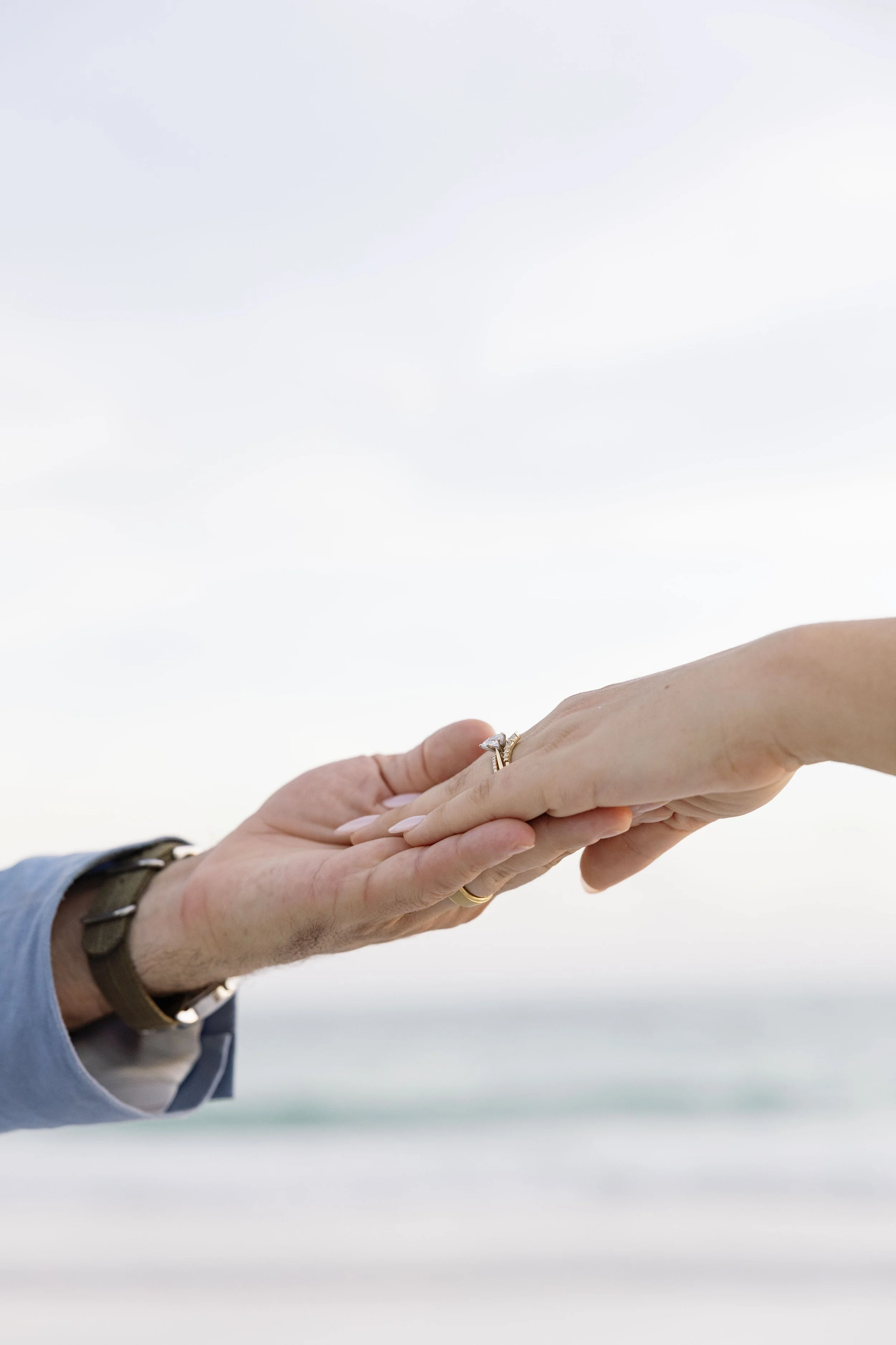 sand-ceremony-pouring-hands-detail-grand-pavilion-sandbar-wedding.jpg