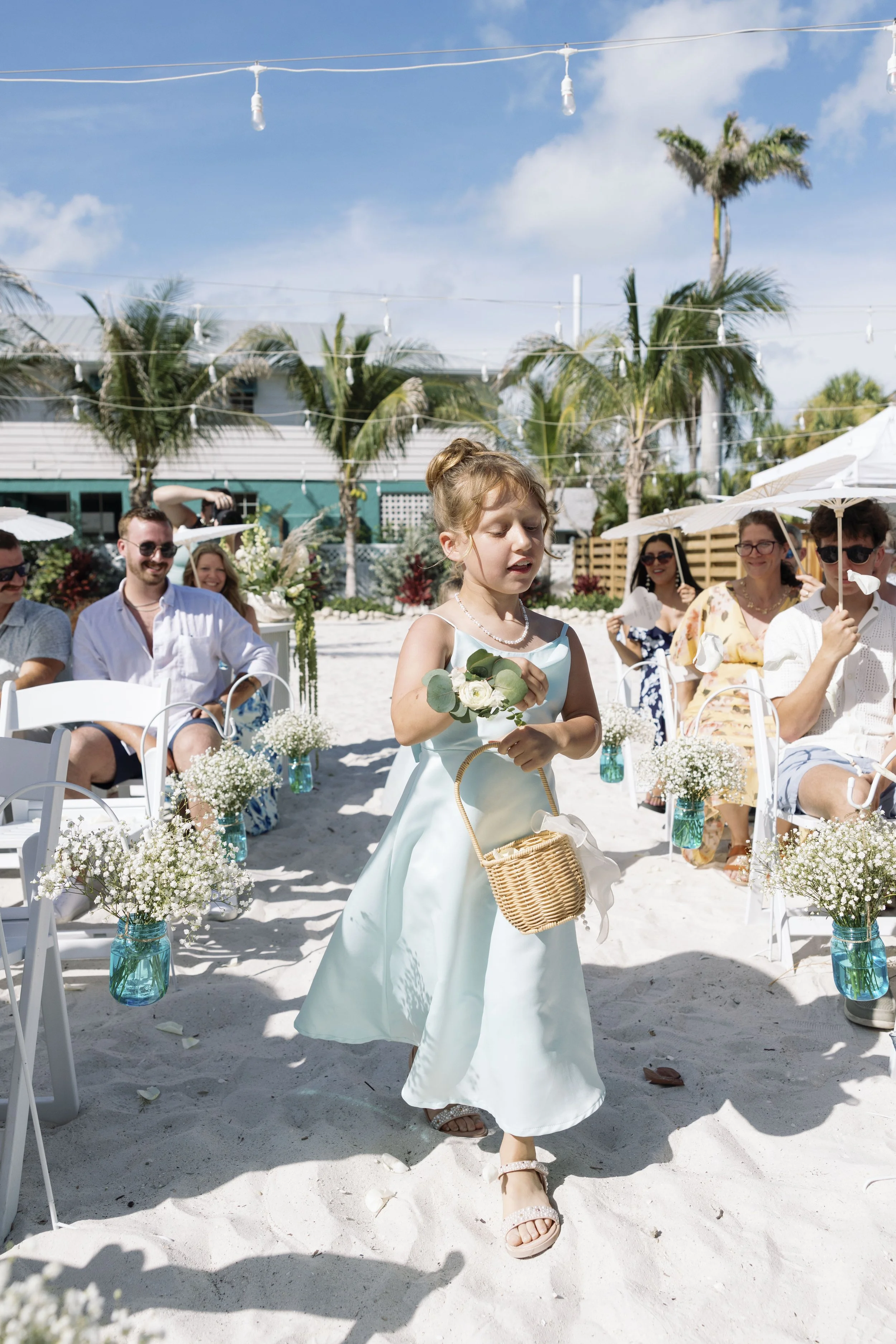 wedding-party-beach-processional-black-and-white-grand-pavilion-sandbar-wedding.jpg